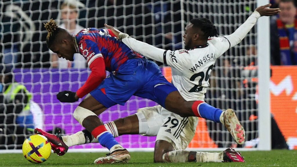 ezgif.com webp to jpg 14 Wan-Bissaka Anticipates Reunion with Ex-Teammate Zaha in Champions League Clash