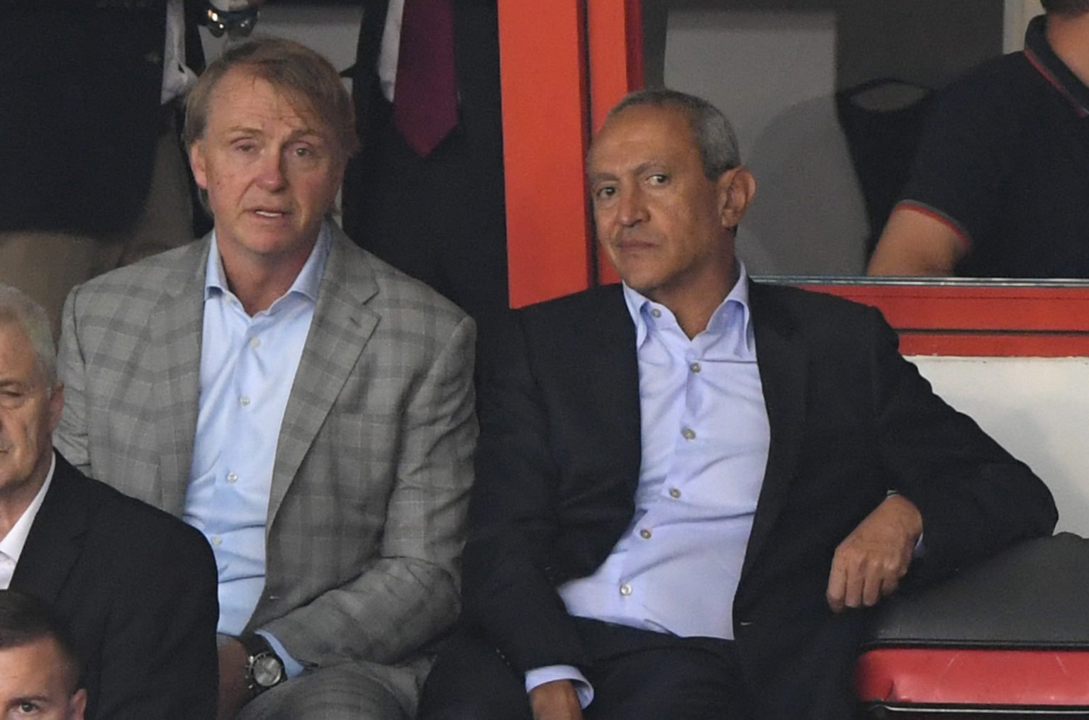 New Aston Villa owners Nassef Sawiris (r) and Wes Edens look on during a friendly match between Aston Villa and West Ham United at Banks' Stadium o...