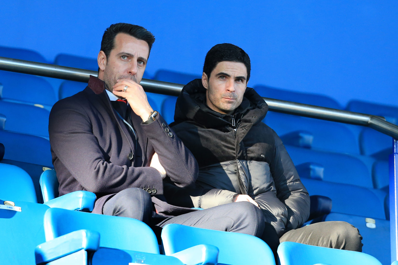 New Arsenal manager Mikel Arteta (R) sits alongside Arsenal Technical Director Edu during the Premier League match between Everton FC and Arsenal F...