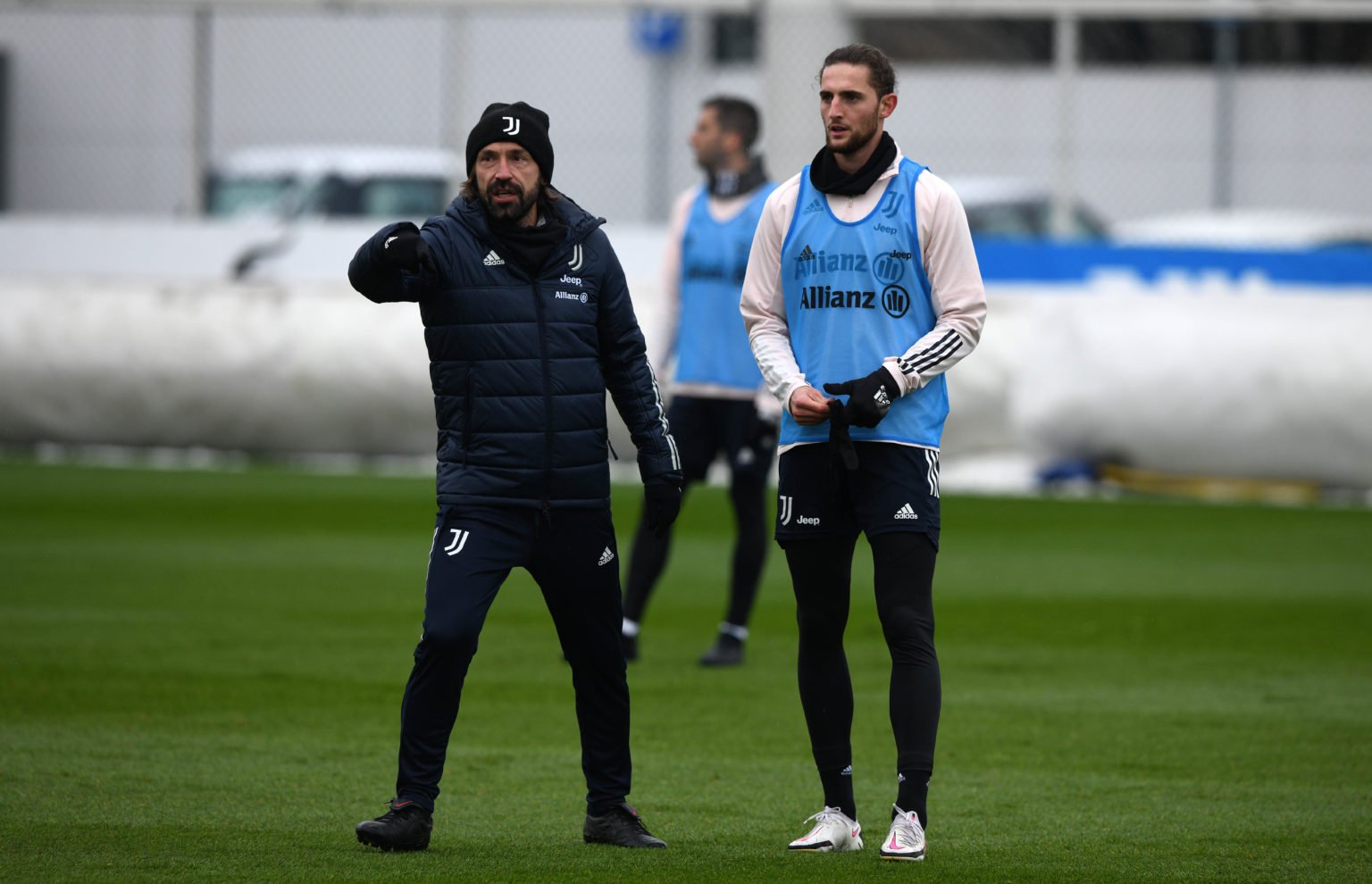 Andrea Pirlo, Manager of Juventus and Adrien Rabiot of Juventus (R) during the Juventus training session at JTC on December 4, 2020 in Turin, Italy.