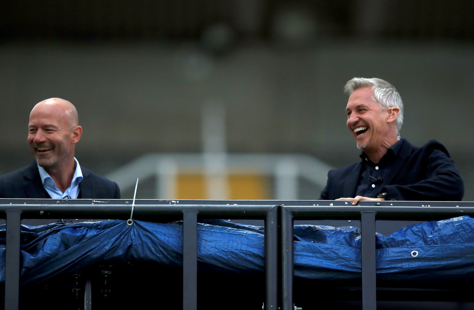 Tv pundits Alan Shearer and Gary Lineker are seen in the tv studio in the stands during the FA Cup Quarter Final match between Newcastle United and...