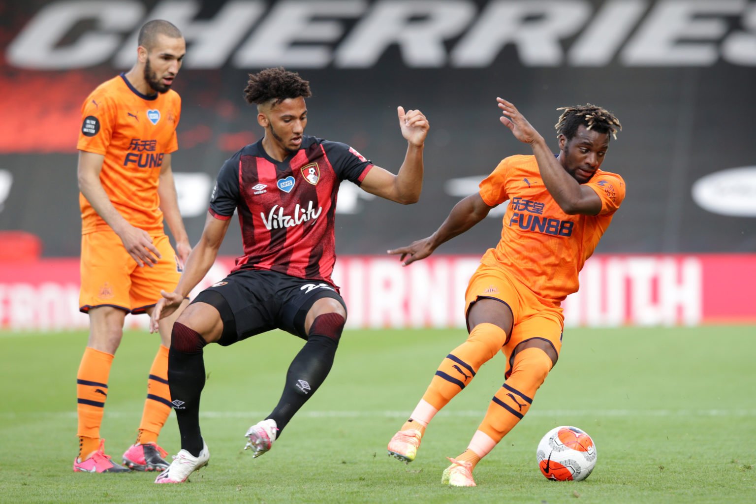 Lloyd Kelly of Bournemouth and Allan Saint-Maximin of Newcastle United during the Premier League match between AFC Bournemouth and Newcastle United...