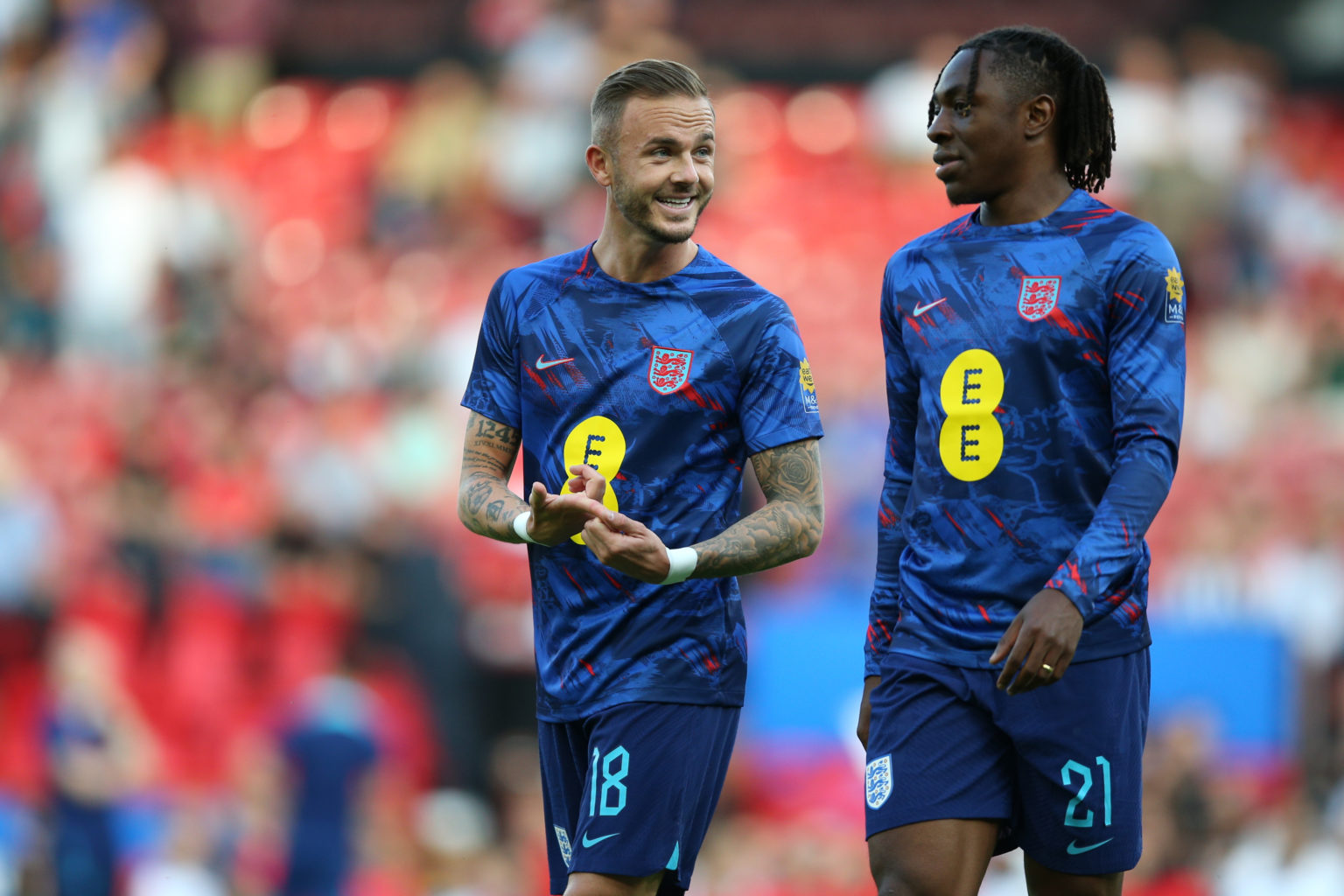 James Maddison of England and Eberechi Eze of England share a joke before UEFA EURO 2024 Qualifying Round Group C match between England and North M...