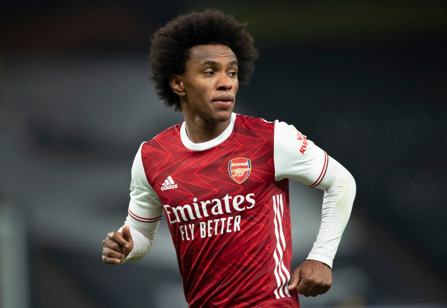 Willian of Arsenal in action during the Premier League match between Tottenham Hotspur and Arsenal at Tottenham Hotspur Stadium on December 6, 2020...