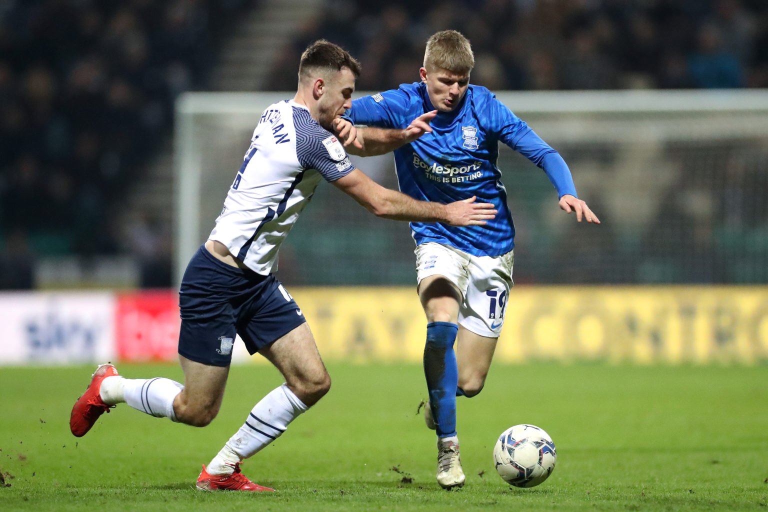 Jordan James of Birmingham City is challenged by Ben Whiteman of Preston North End during the Sky Bet Championship match between Preston North End ...