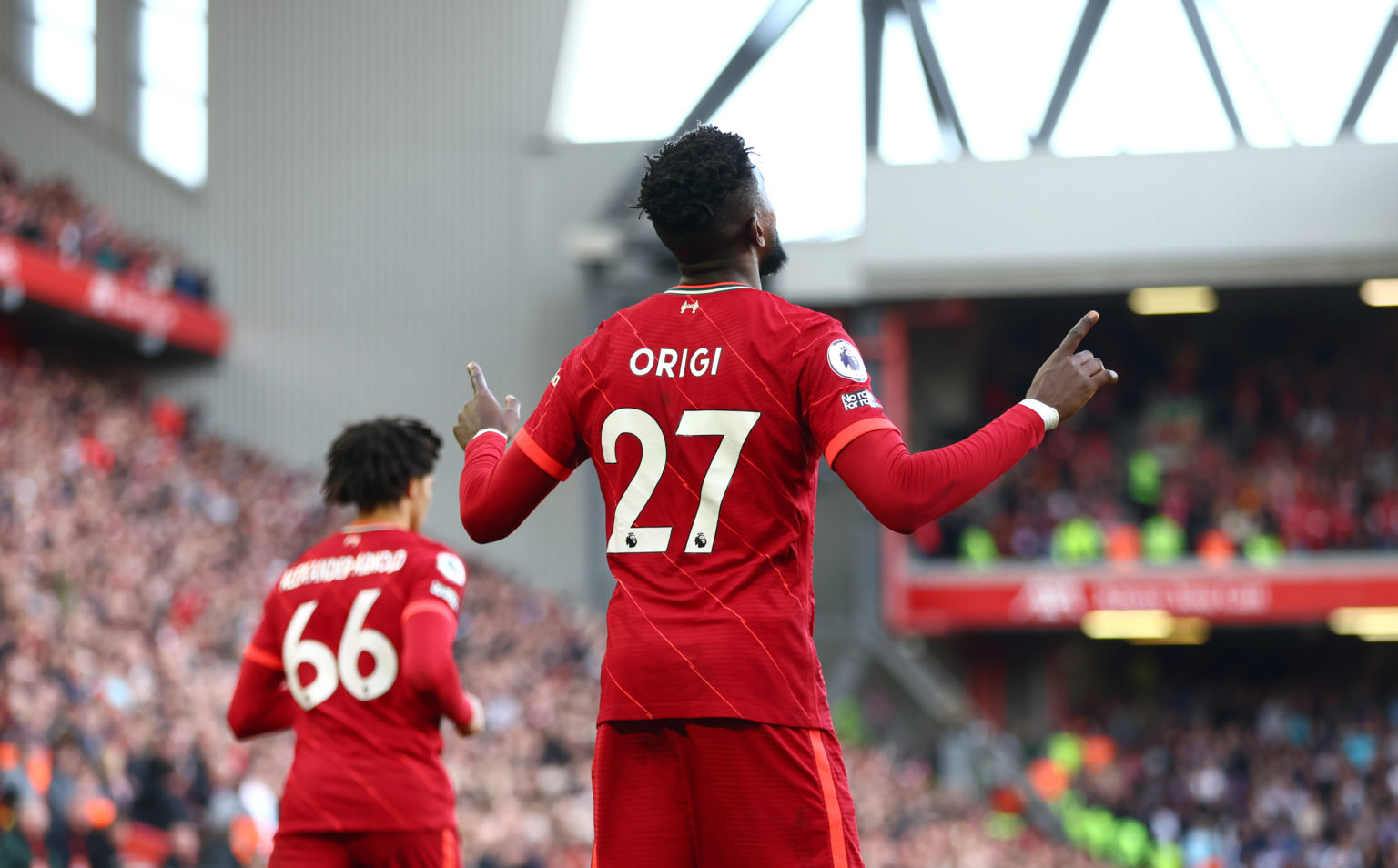 Divock Origi of Liverpool celebrates after scoring their team's second goal during the Premier League match between Liverpool and Everton at Anfiel...