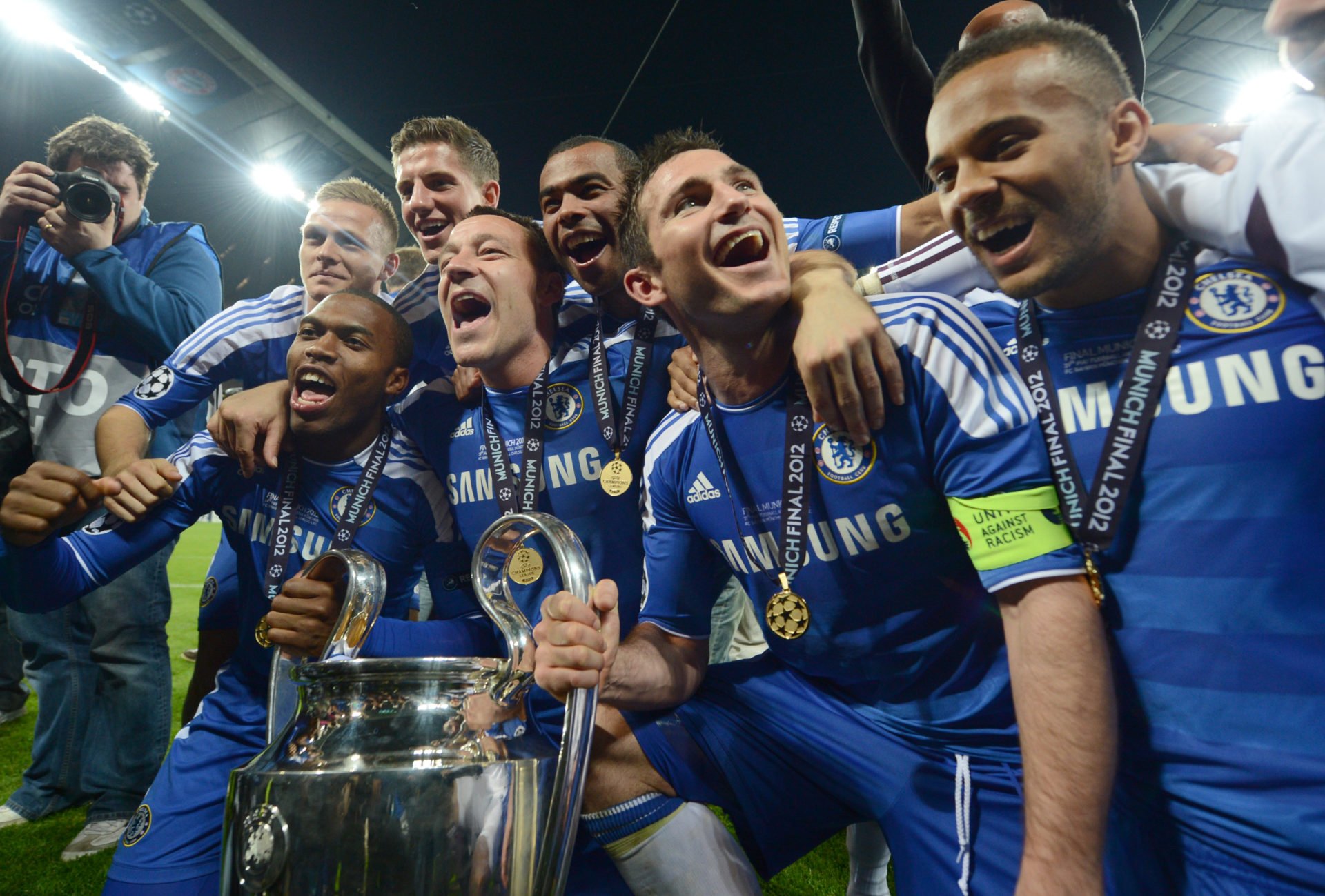 Chelsea's players pose with the trophy after the UEFA Champions League final football match between FC Bayern Muenchen and Chelsea FC on May 19, 20...