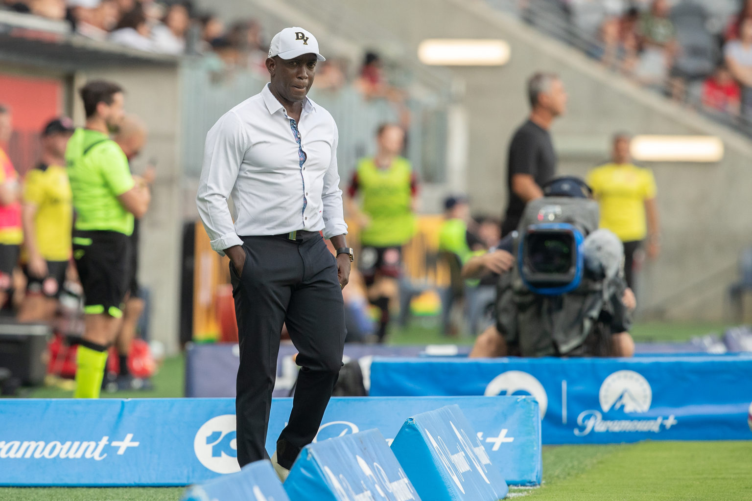 Dwight Yorke of the Bulls watches his team during the round 10 A-League Men's match between Western Sydney Wanderers and Macarthur FC at CommBank S...