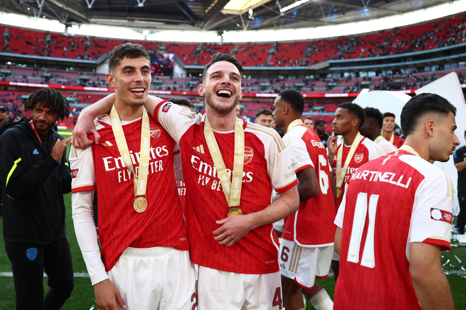 Kai Havertz and Declan Rice of Arsenal celebrate with their medals following the team's victory in the penalty shootout during The FA Community Shi...