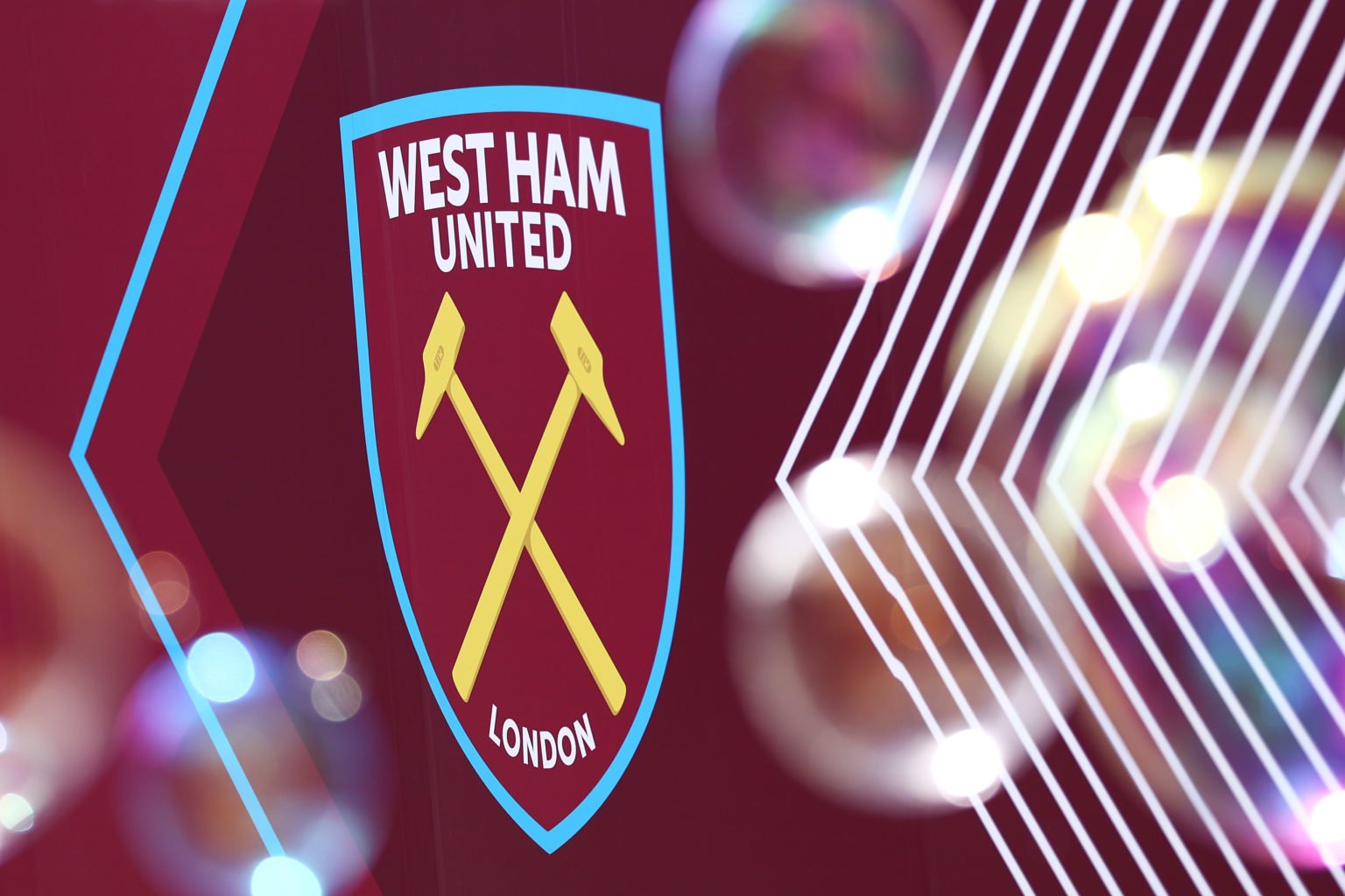 A detailed view of the badge of West Ham United as bubbles are seen prior to the Premier League match between West Ham United and Chelsea FC at Lon...