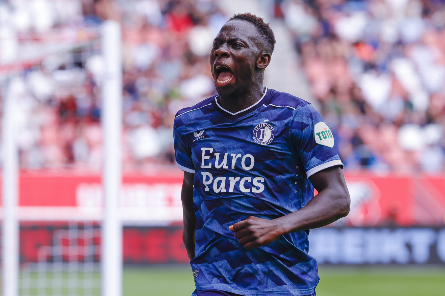 Yankuba Minteh of Feyenoord Rotterdam celebrates after scoring the 1-5 during the Dutch Eredivisie match between FC Utrecht and Feyenoord at Stadio...