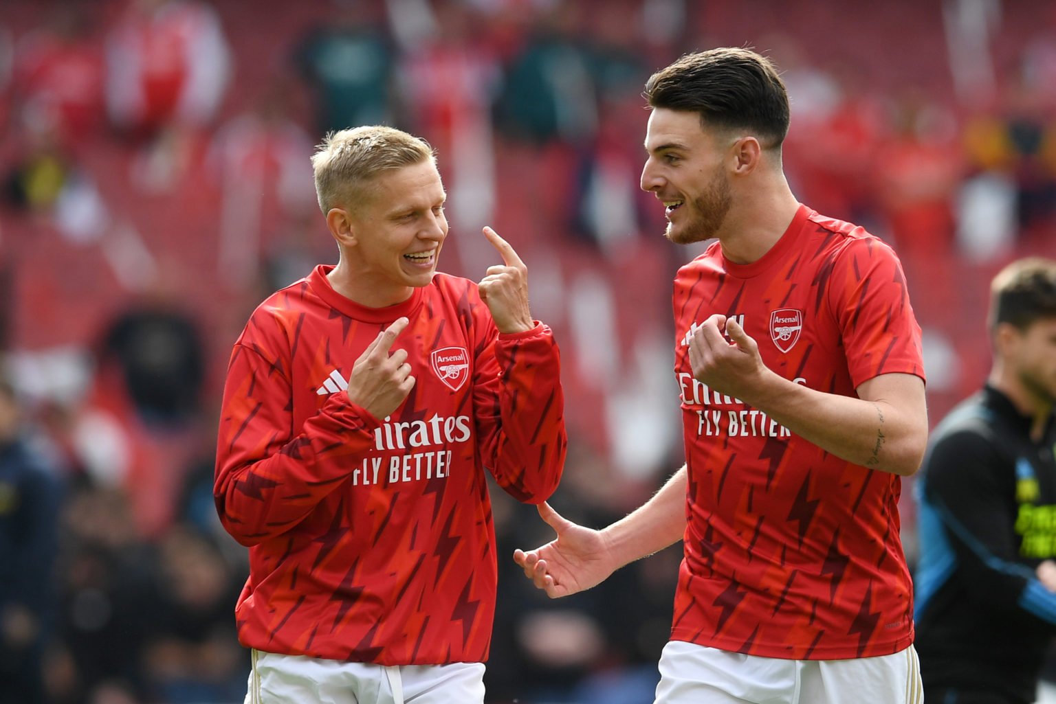 Oleksandr Zinchenko and Declan Rice of Arsenal warm up prior to the Premier League match between Arsenal FC and Tottenham Hotspur at Emirates Stadi...