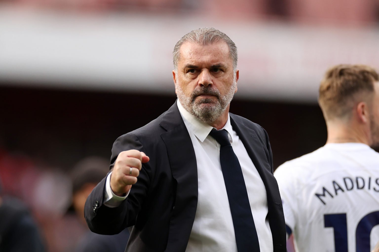 Ange Postecoglou, Manager of Tottenham Hotspur, acknowledges the fans after the Premier League match between Arsenal FC and Tottenham Hotspur at Em...