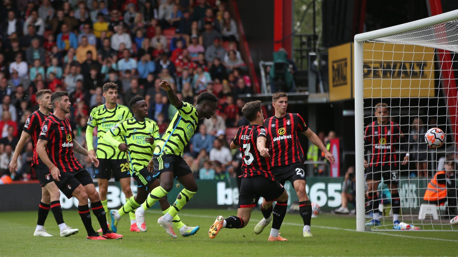 Bukayo Saka of Arsenal scores the team's first goal during the Premier League match between AFC Bournemouth and Arsenal FC at Vitality Stadium on S...