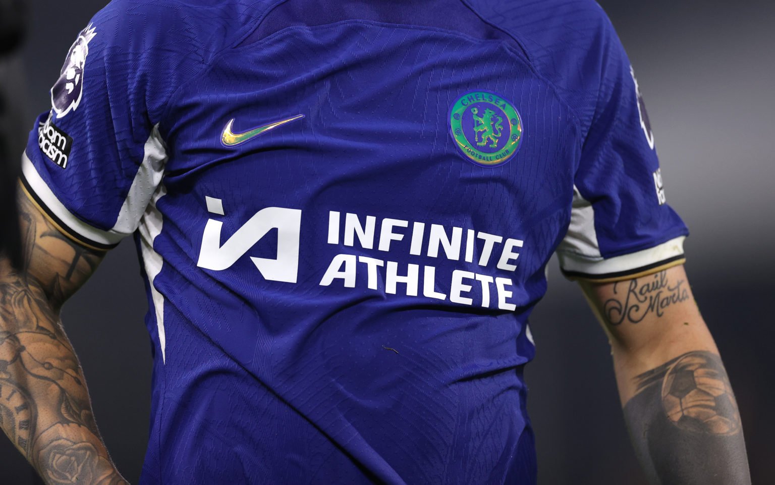 A detail of the Infinite Athlete Sponsor logo on the Chelsea shirt during the Premier League match between Fulham FC and Chelsea FC at Craven Cotta...