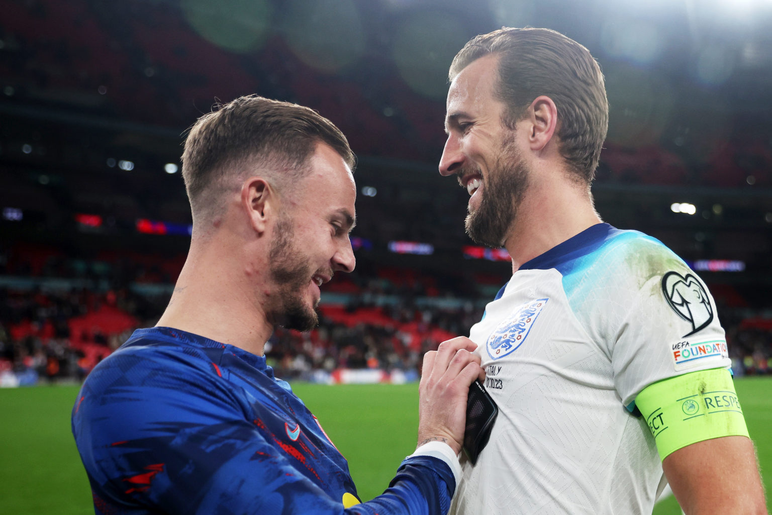 James Maddison and Harry Kane of England celebrate after the team's victory during the UEFA EURO 2024 European qualifier match between England and ...