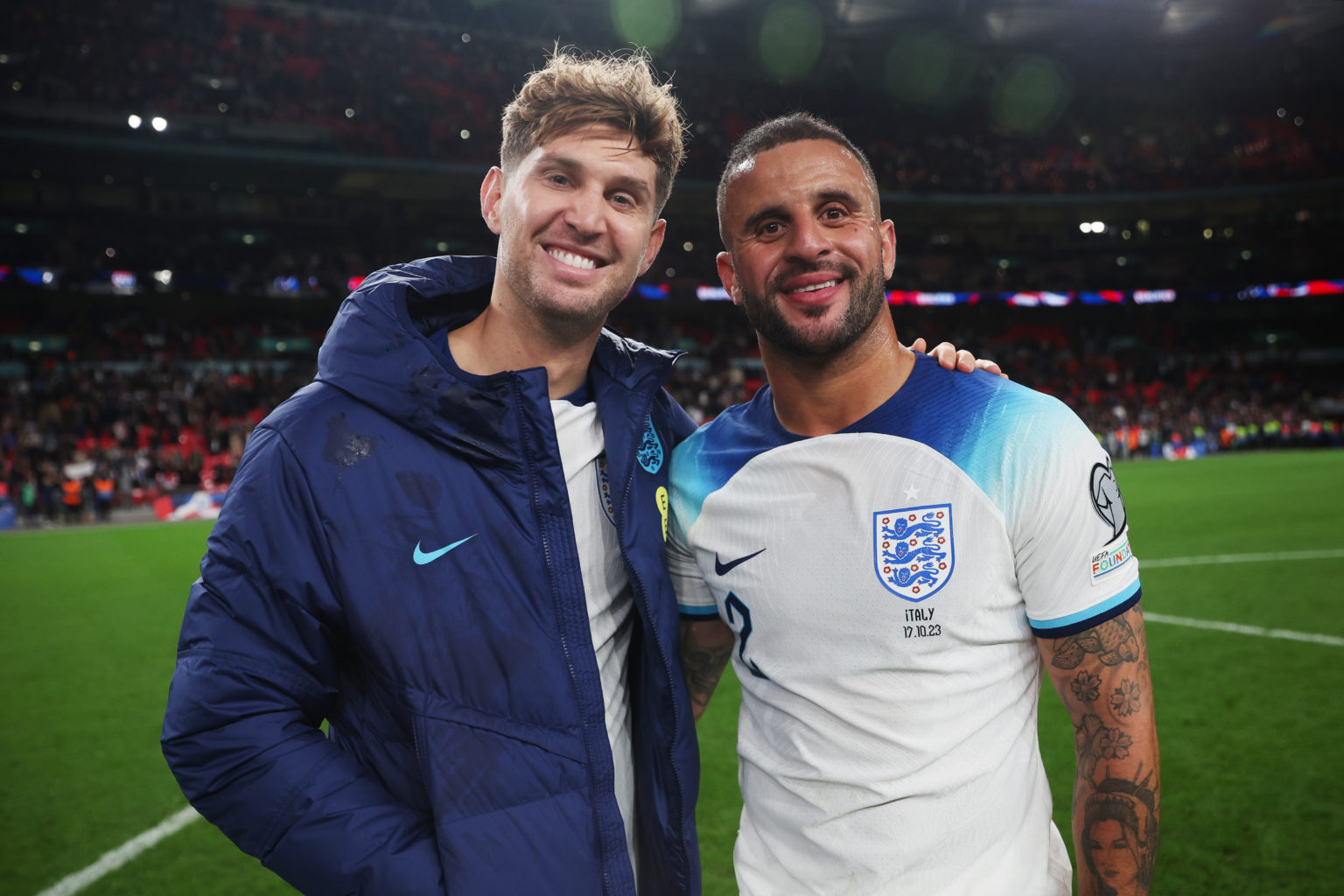 John Stones and Kyle Walker of England pose for a photo after the team's victory during the UEFA EURO 2024 European qualifier match between England...