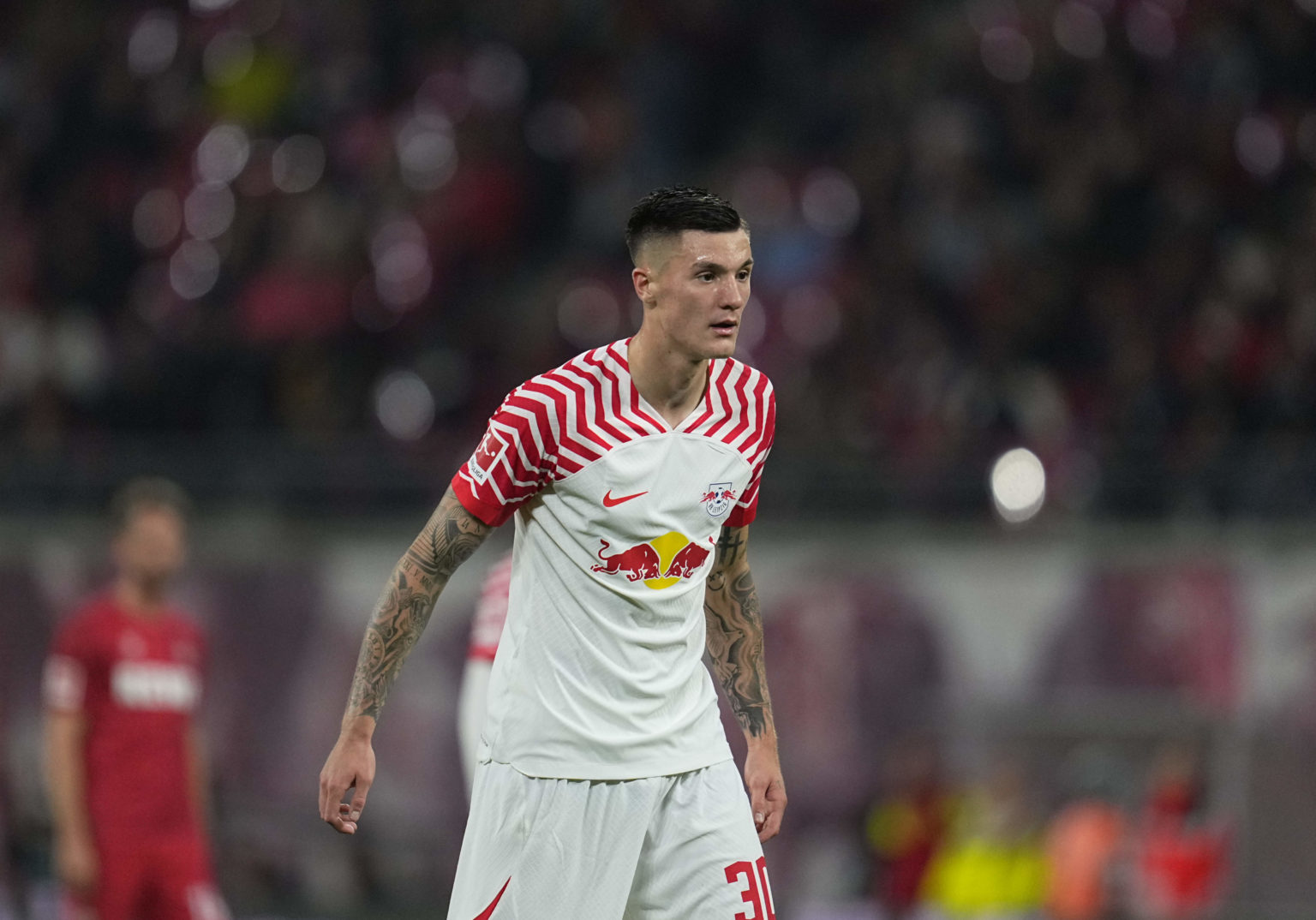 Benjamin Sesko of RB Leipzig looks on during the Bundesliga match between RB Leipzig and 1. FC Köln at Red Bull Arena on October 28, 2023 in Leipzi...