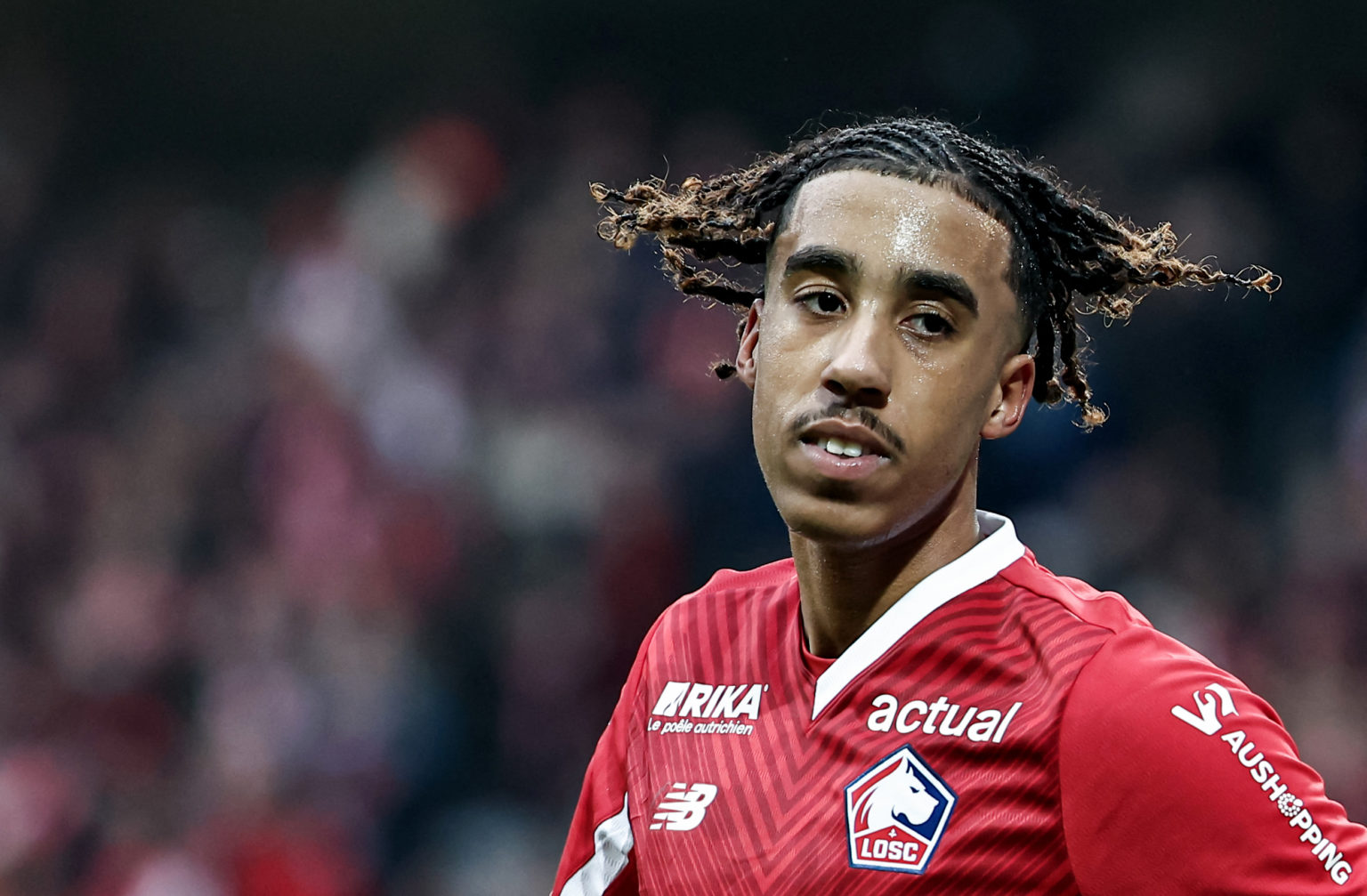 TOPSHOT - Lille's French defender #15 Leny Yoro celebrates after scoring his team's first goal during the French L1 football match between Lille OS...