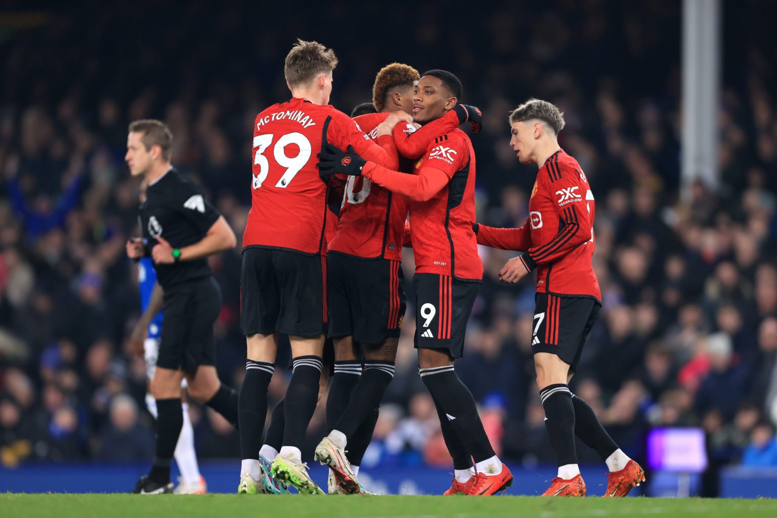 Anthony Martial of Manchester United celebrates their 2nd goal with teammates during the Premier League match between Everton FC and Manchester Uni...