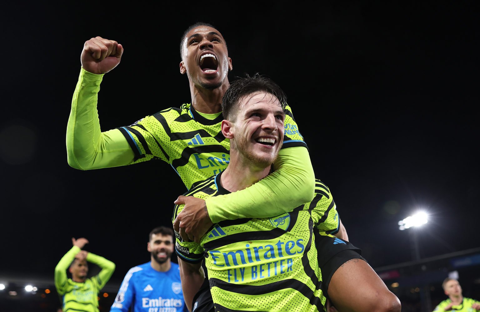 Declan Rice of Arsenal celebrates victory with teammate Gabriel after defeating Luton Town 4-3 with a last minute winner during the Premier League ...