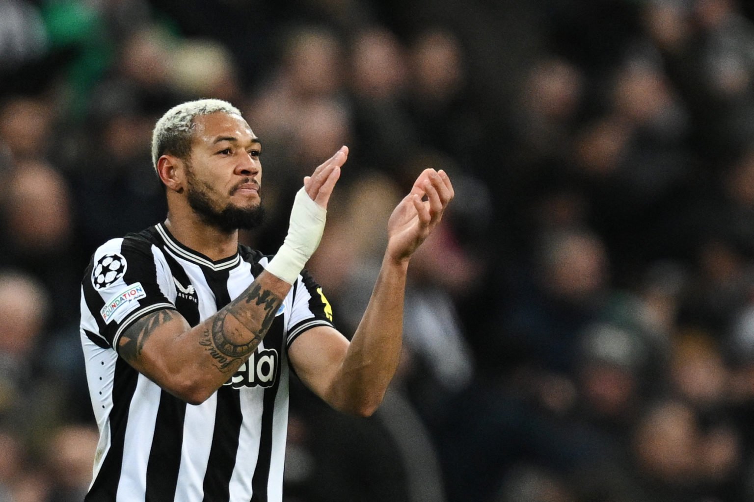 Newcastle United's Brazilian striker #07 Joelinton celebrates after scoring his team first goal during the UEFA Champions League Group F football m...