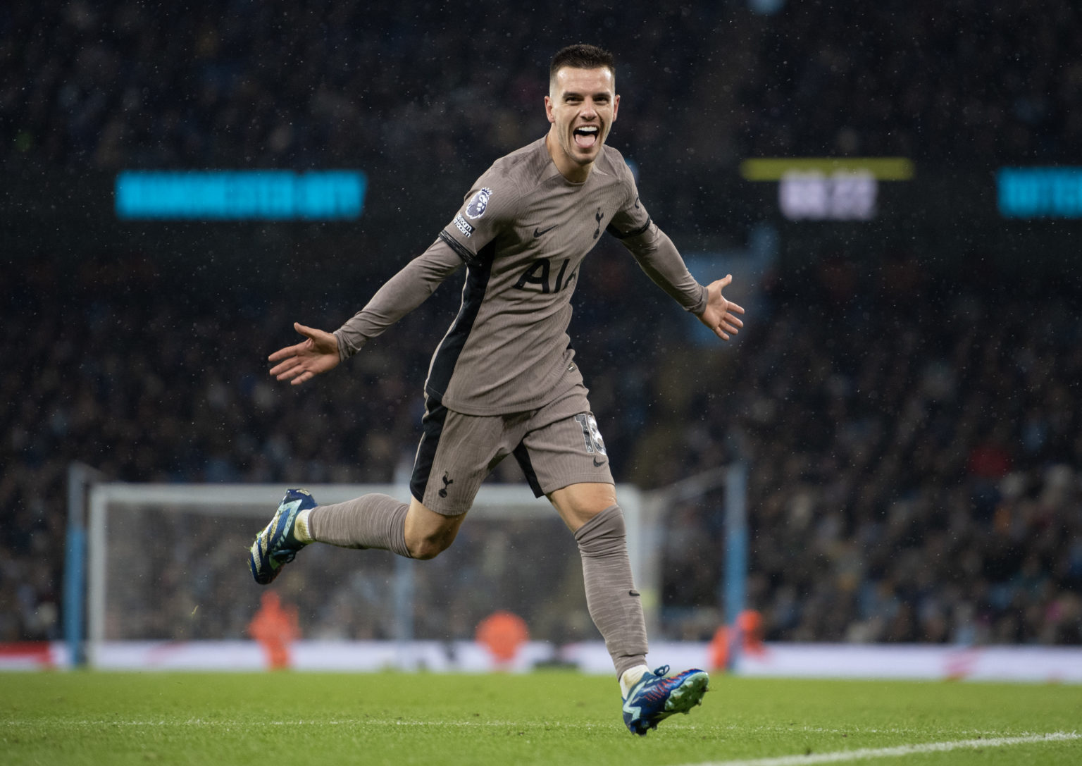 Giovani Lo Celso of Tottenham Hotspur celebrates after scoring his team's second goal during the Premier League match between Manchester City and T...