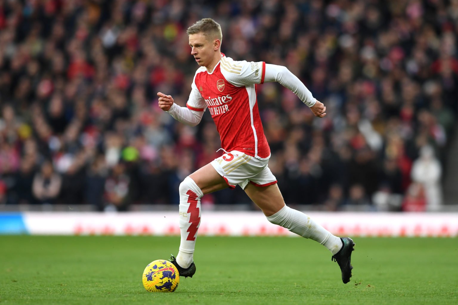 Oleksandr Zinchenko of Arsenal runs with the ball during the Premier League match between Arsenal FC and Brighton & Hove Albion at Emirates Sta...