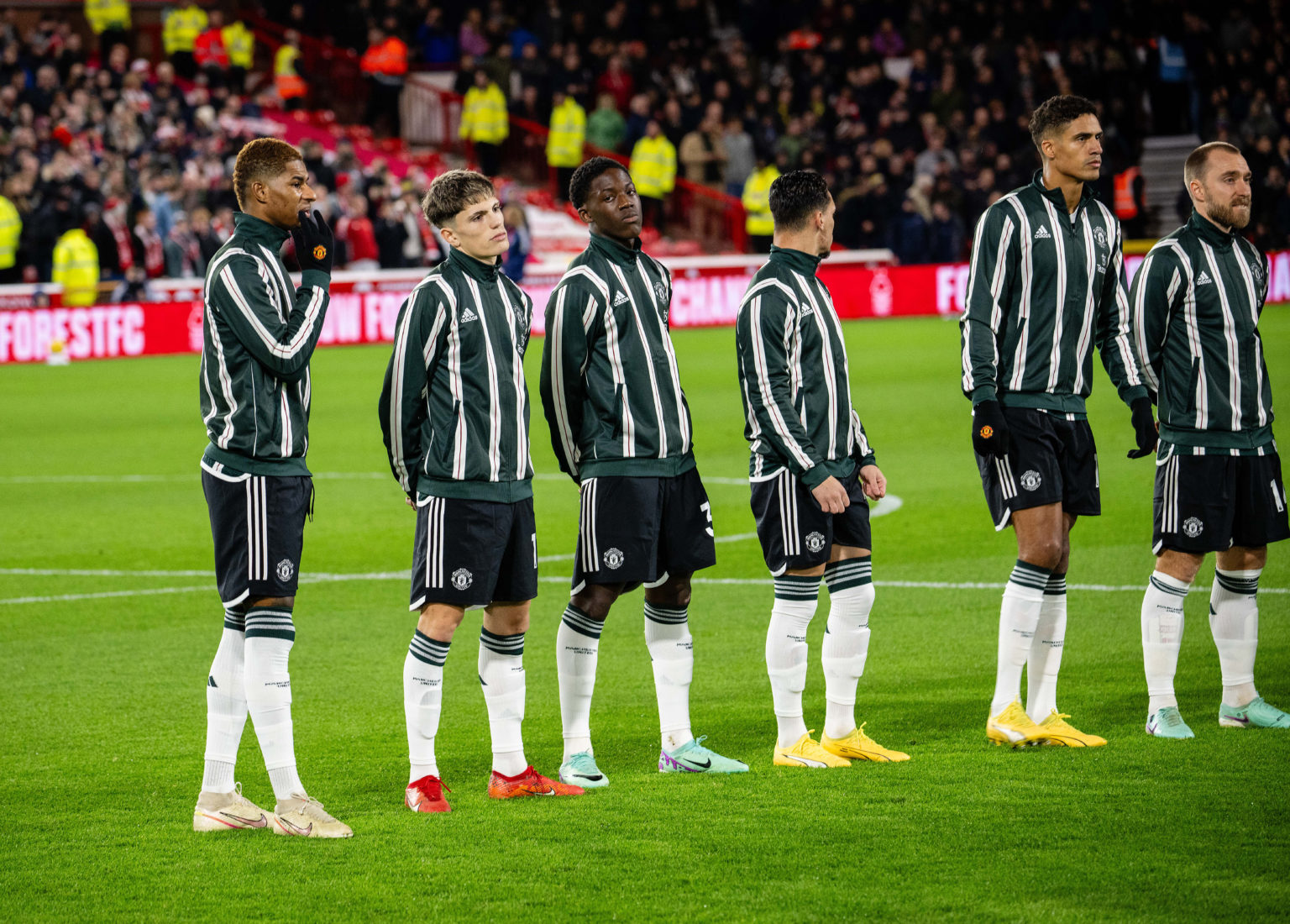 Marcus Rashford, Alejandro Garnacho, Kobbie Mainoo, Antony, Raphael Varane and Christian Eriksen of Manchester United line up ahead of the Premier ...