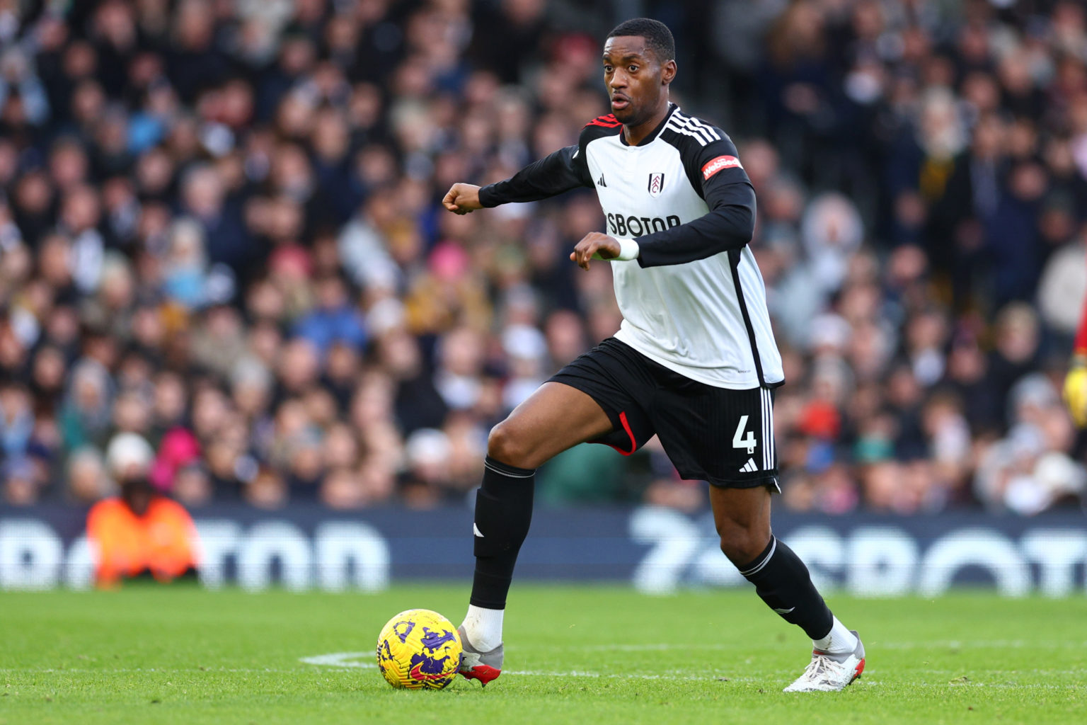 Tosin Adarabioyo of Fulham during the Premier League match between Fulham FC and Arsenal FC at Craven Cottage on December 31, 2023 in London, England.