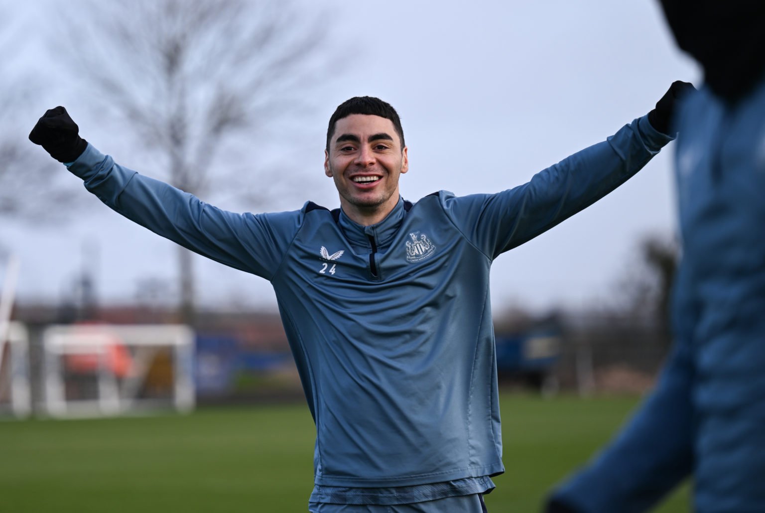 Miguel Almirón smiles during the Newcastle United Training Session at the Newcastle United Training Centre on January 24, 2024 in Newcastle upon Ty...