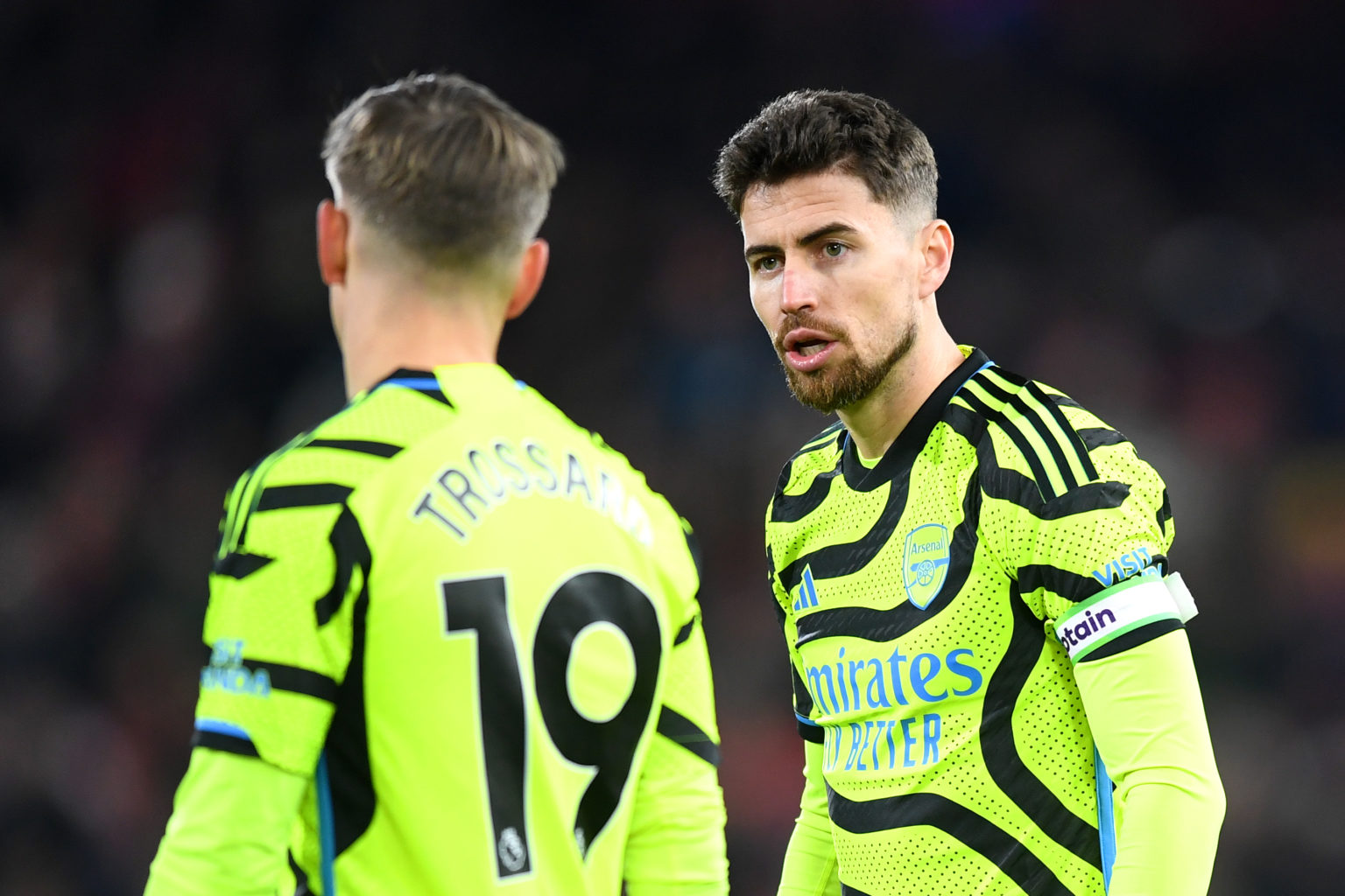 Jorginho of Arsenal speaks with teammate Leandro Trossard during the Premier League match between Nottingham Forest and Arsenal FC at City Ground o...