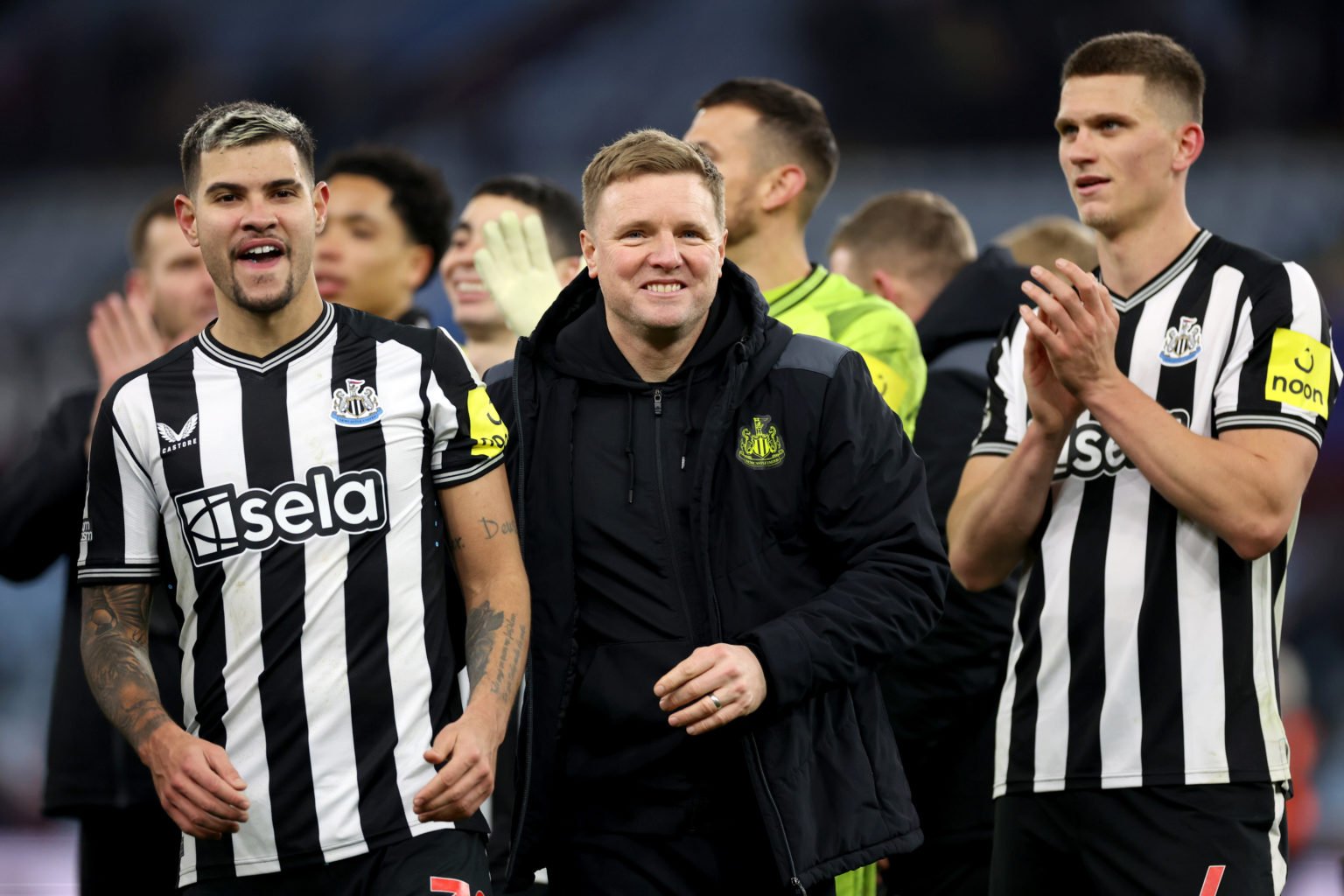 Bruno Guimaraes of Newcastle United and Eddie Howe, Manager of Newcastle United, show appreciation to the fans at full-time following the teams vic...