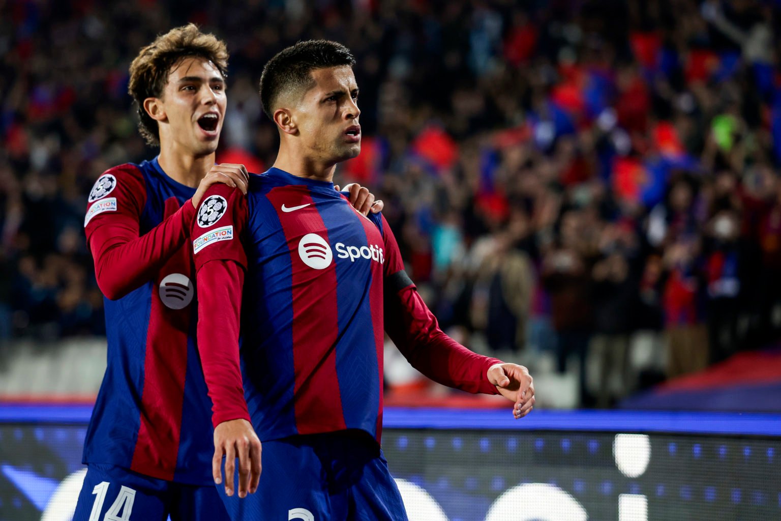 Joao Cancelo of FC Barcelona celebrates goal 1-1 with Joao Felix of FC Barcelona during the UEFA Champions League  match between FC Barcelona v FC ...