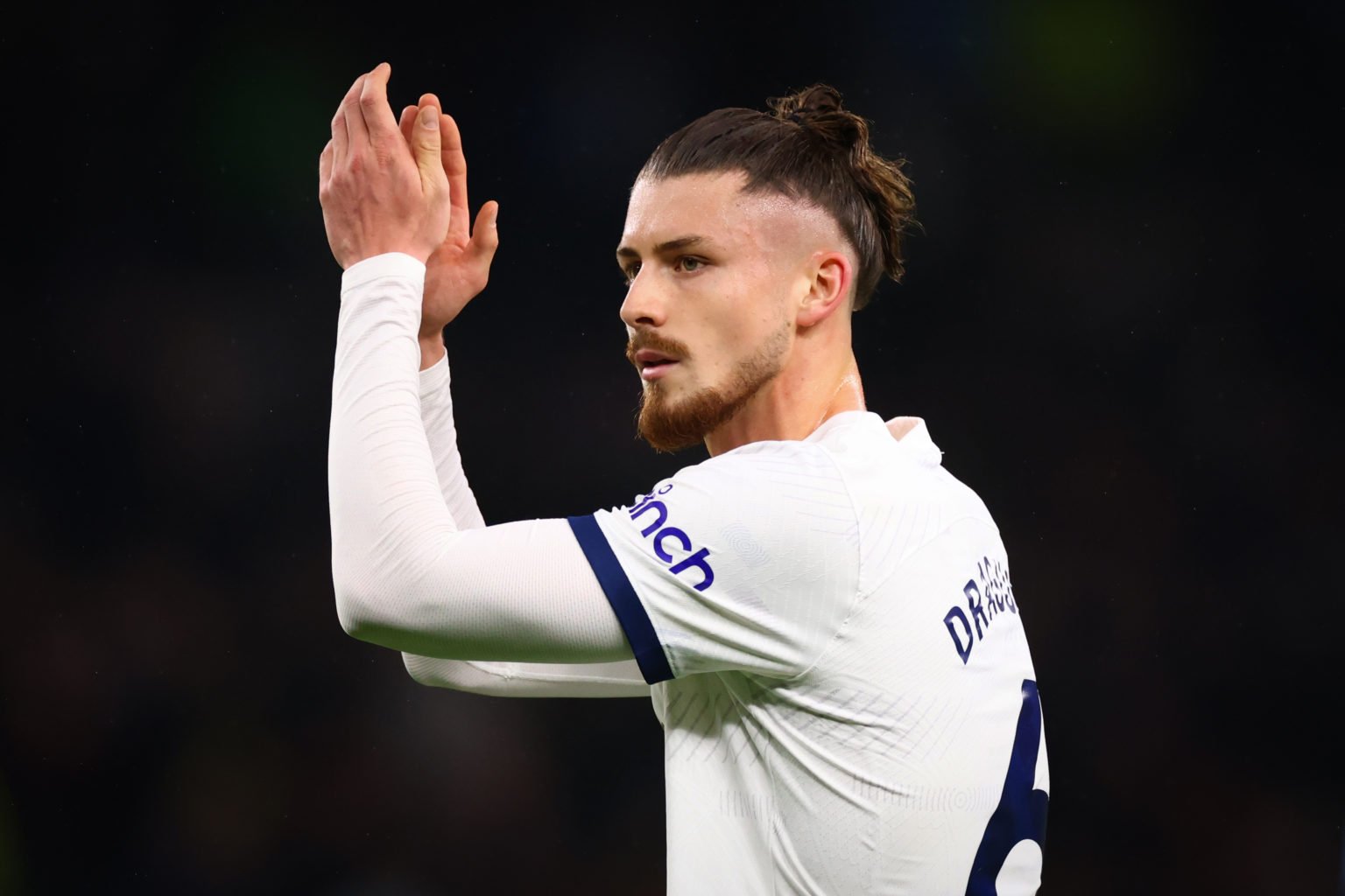 Radu Dragusin of Tottenham Hotspur acknowledges the fans after the Premier League match between Tottenham Hotspur and Brentford FC at Tottenham Hot...