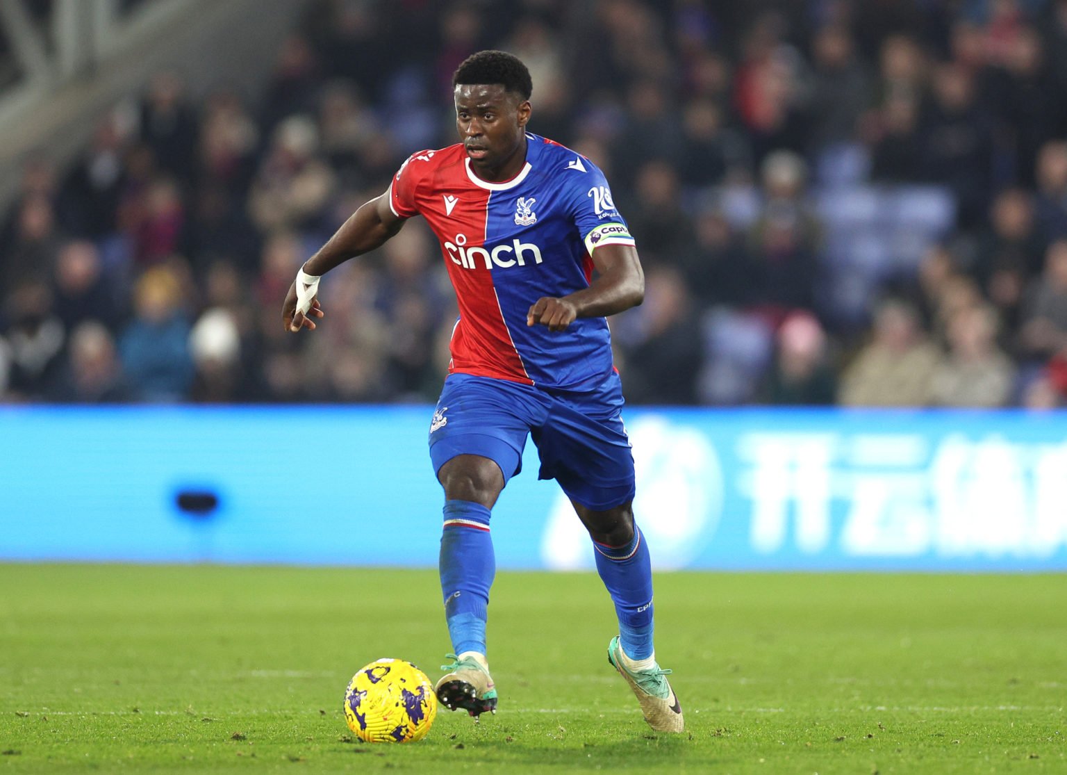 Marc Guehi, Captain of Crystal Palace controls the ball during the Premier League match between Crystal Palace and Sheffield United at Selhurst Par...