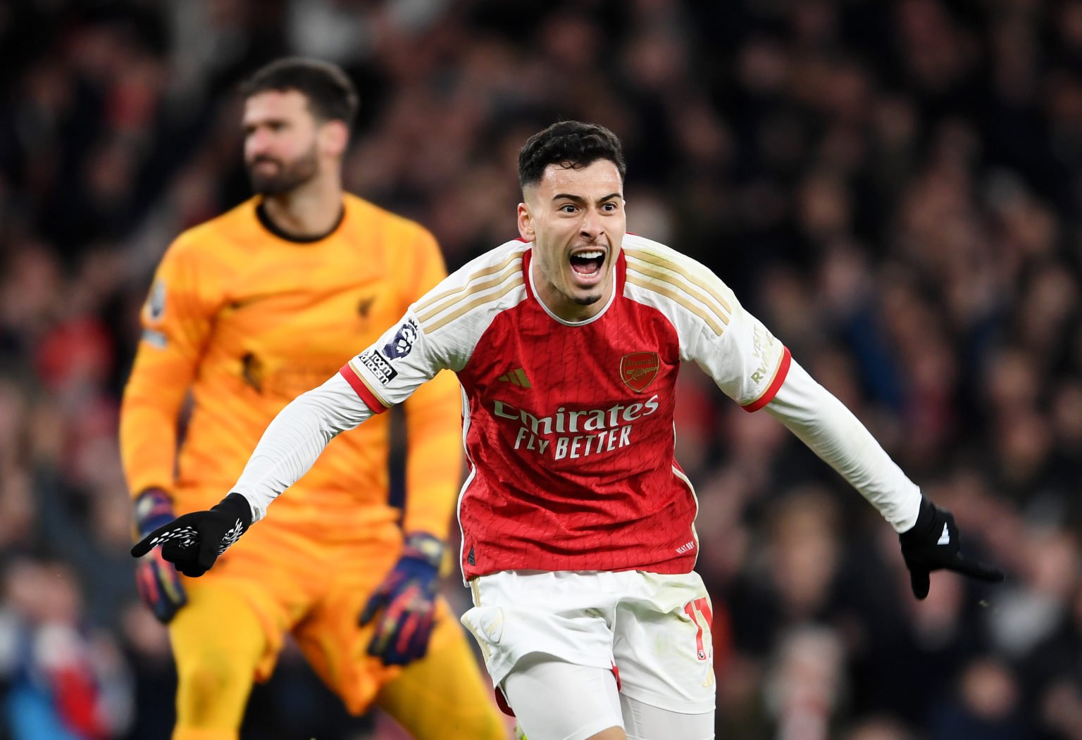 Gabriel Martinelli of Arsenal celebrates scoring his team's second goal during the Premier League match between Arsenal FC and Liverpool FC at Emir...