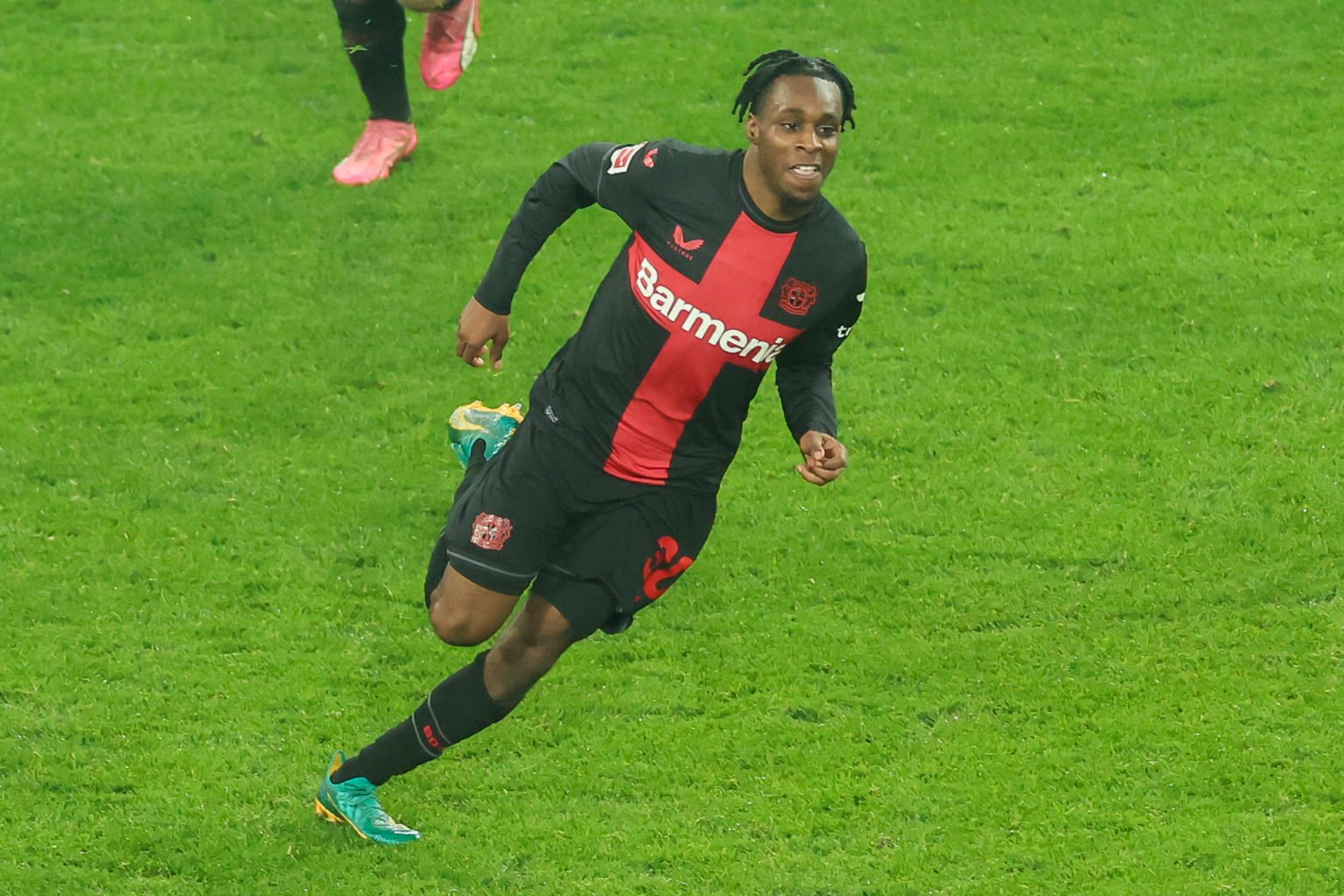 Jeremie Frimpong of Bayer 04 Leverkusen celebrates after scoring his teams third goal during the Bundesliga match between Bayer 04 Leverkusen and F...