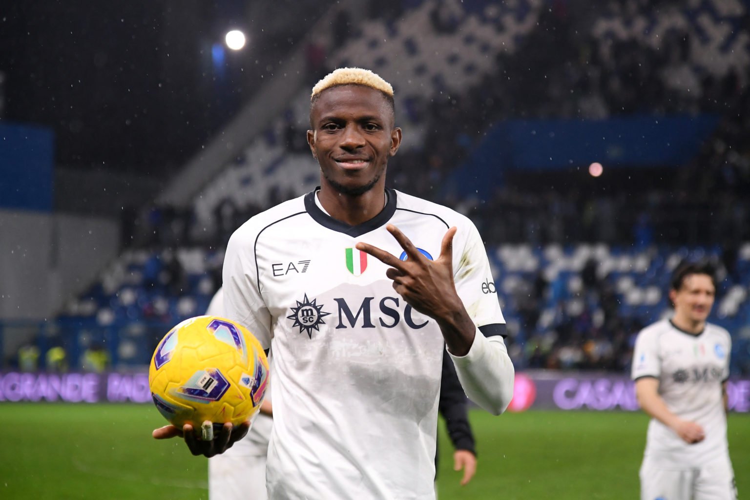 Victor Osimhen of SSC Napoli gestures whilst holding the match ball after his hat-trick during the victory in the Serie A TIM match between US Sass...