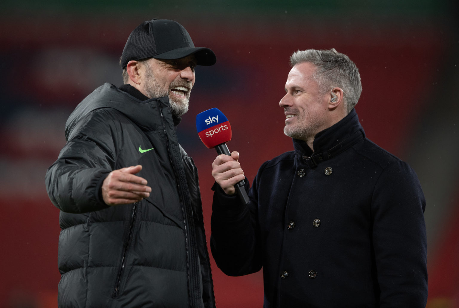 Liverpool manager Jurgen Klopp is interviewed by Sky Sports commentator Jamie Carragher during the Carabao Cup Final match between Chelsea and Live...