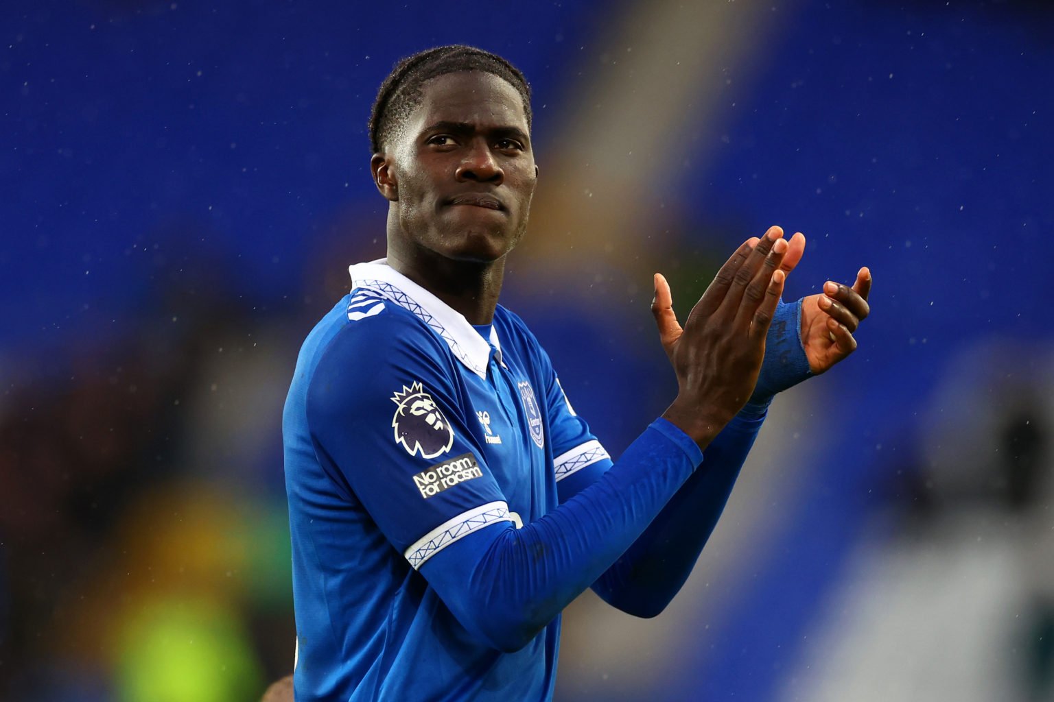 Amadou Onana of Everton applauds the supporters following the Premier League match between Everton FC and West Ham United at Goodison Park on March...