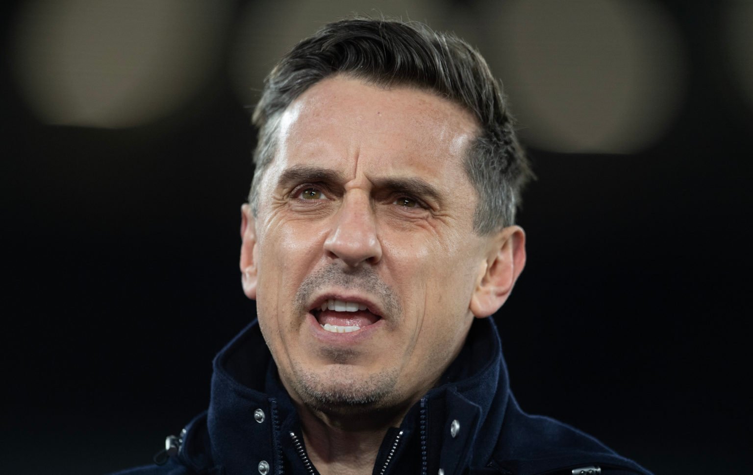 Sky Sports pundit Gary Neville is seen prior to the Premier League match between West Ham United and Brentford FC at London Stadium on February 26,...