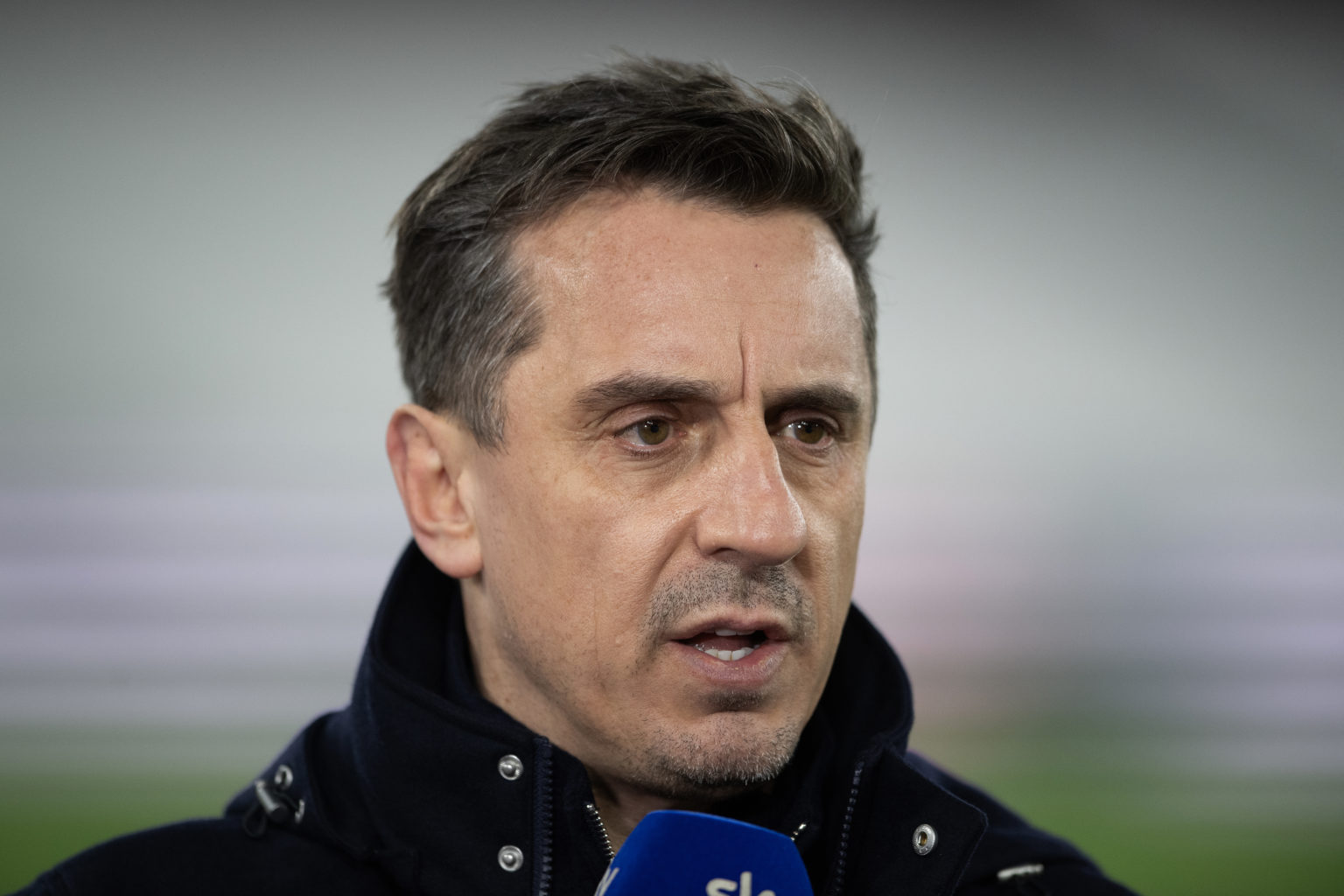 Sky Sports pundit Gary Neville is seen prior to the Premier League match between West Ham United and Brentford FC at London Stadium on February 26,...