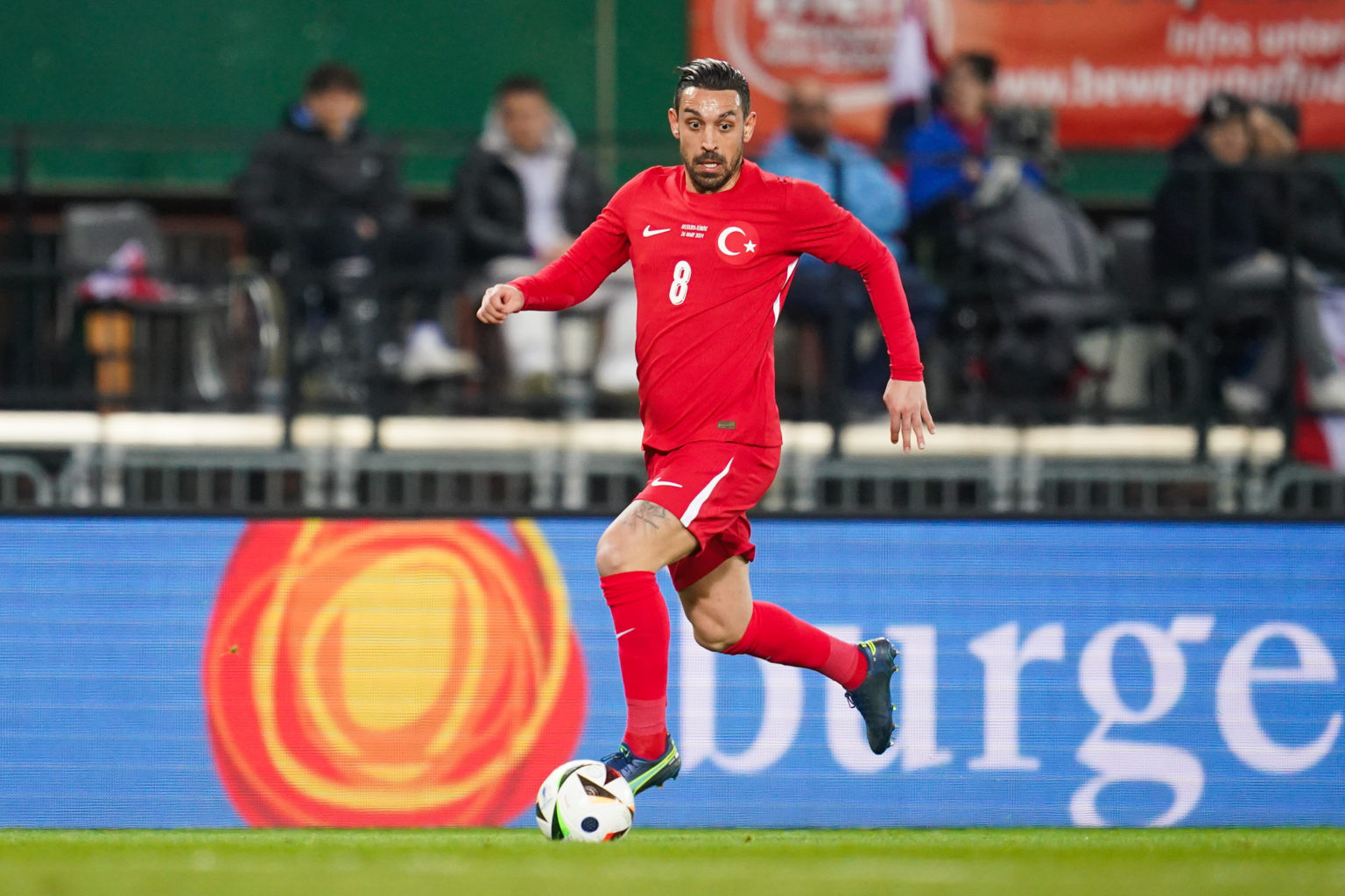 Irfan Can Kahveci of Turkiye runs with the ball during the international friendly match between Austria and Turkiye at Ernst Happel Stadion on Marc...