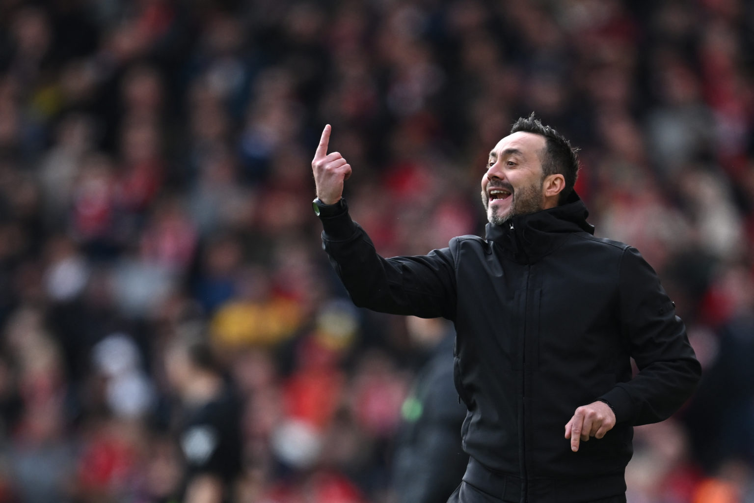 Brighton's Italian head coach Roberto De Zerbi reacts during the English Premier League football match between Liverpool and Brighton and Hove Albi...