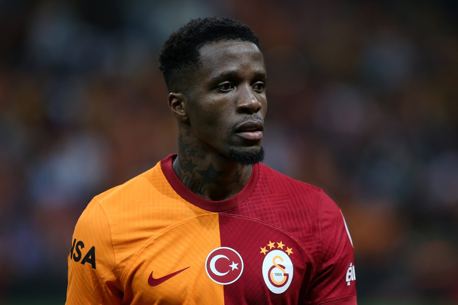 Wilfried Zaha of Galatasaray looks on during the Turkish Super League match between Galatasaray and Hatayspor Rams Park on April 2, 2024 in Istanbu...