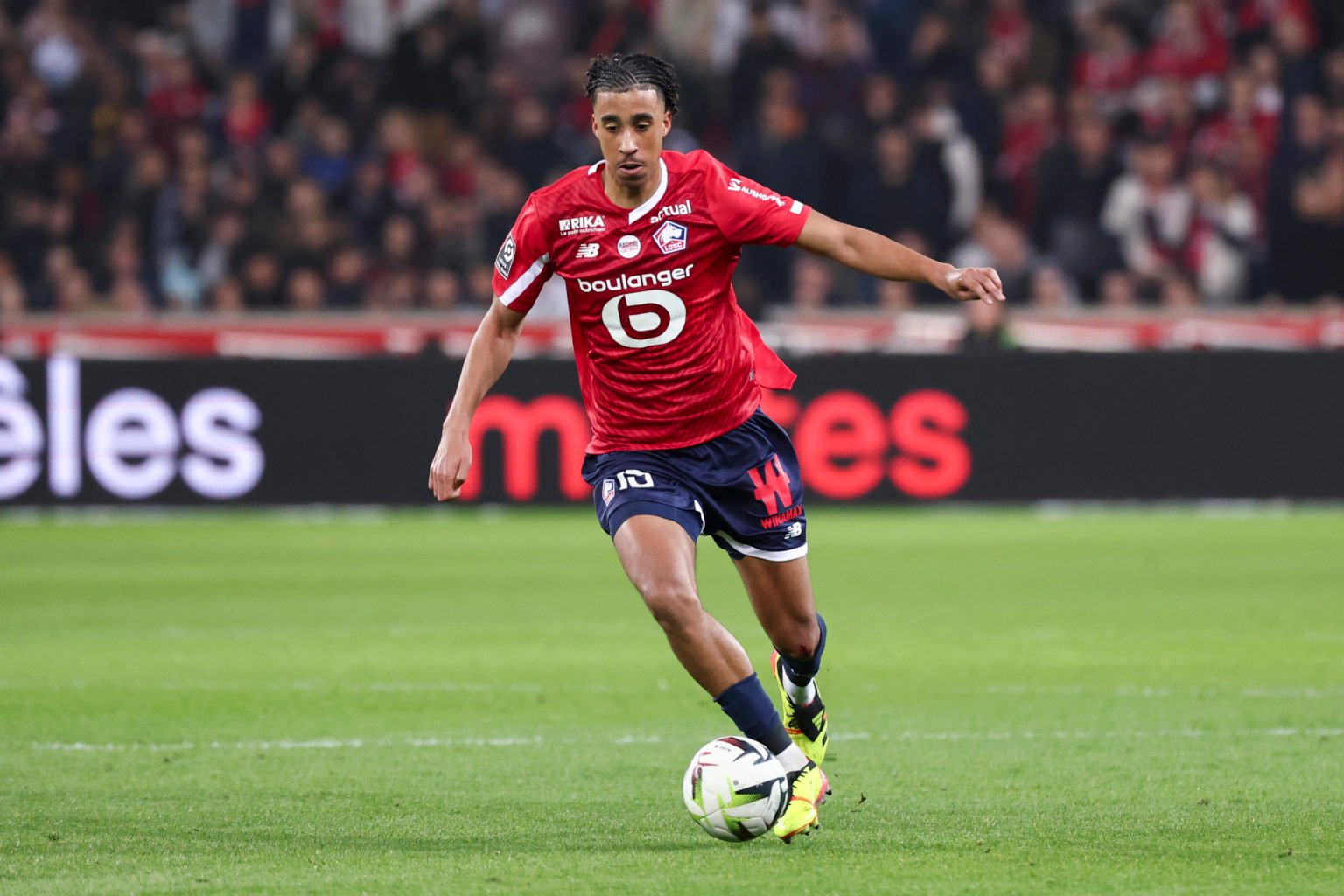 Leny Yoro #15 of Lille OSC controls the ball during the Ligue 1 Uber Eats match between Lille OSC and RC Lens at Stade Pierre Mauroy on March 29, 2...