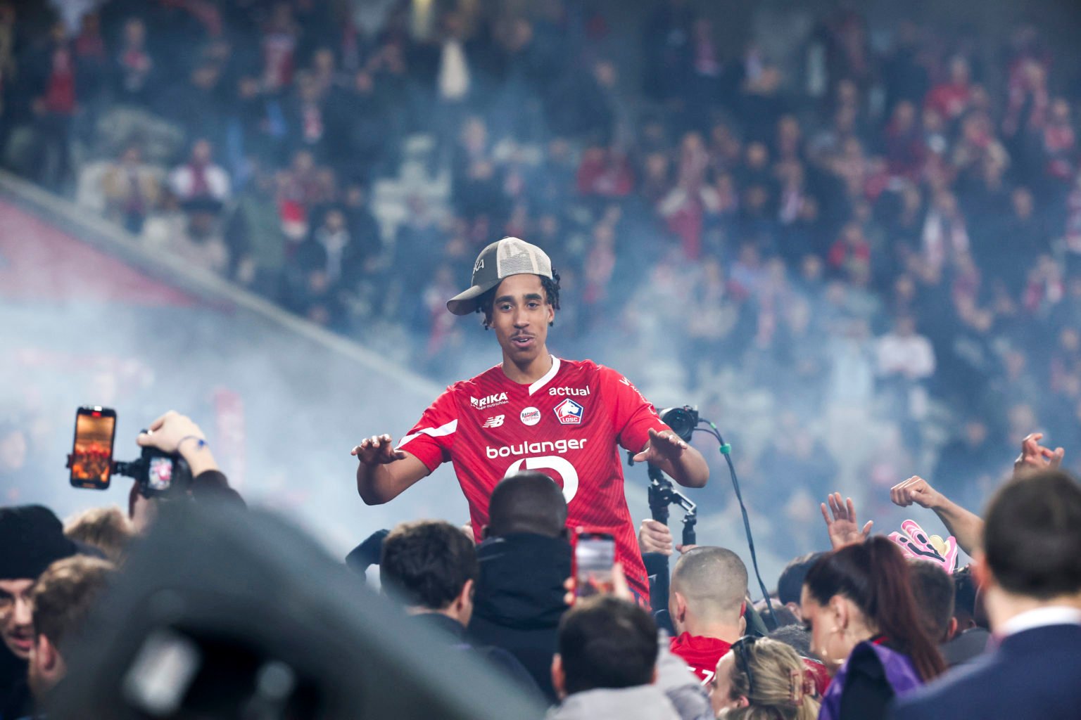 Leny Yoro #15 of Lille OSC celebrates with the fans the victory of the Ligue 1 Uber Eats match between Lille OSC and RC Lens at Stade Pierre Mauroy...