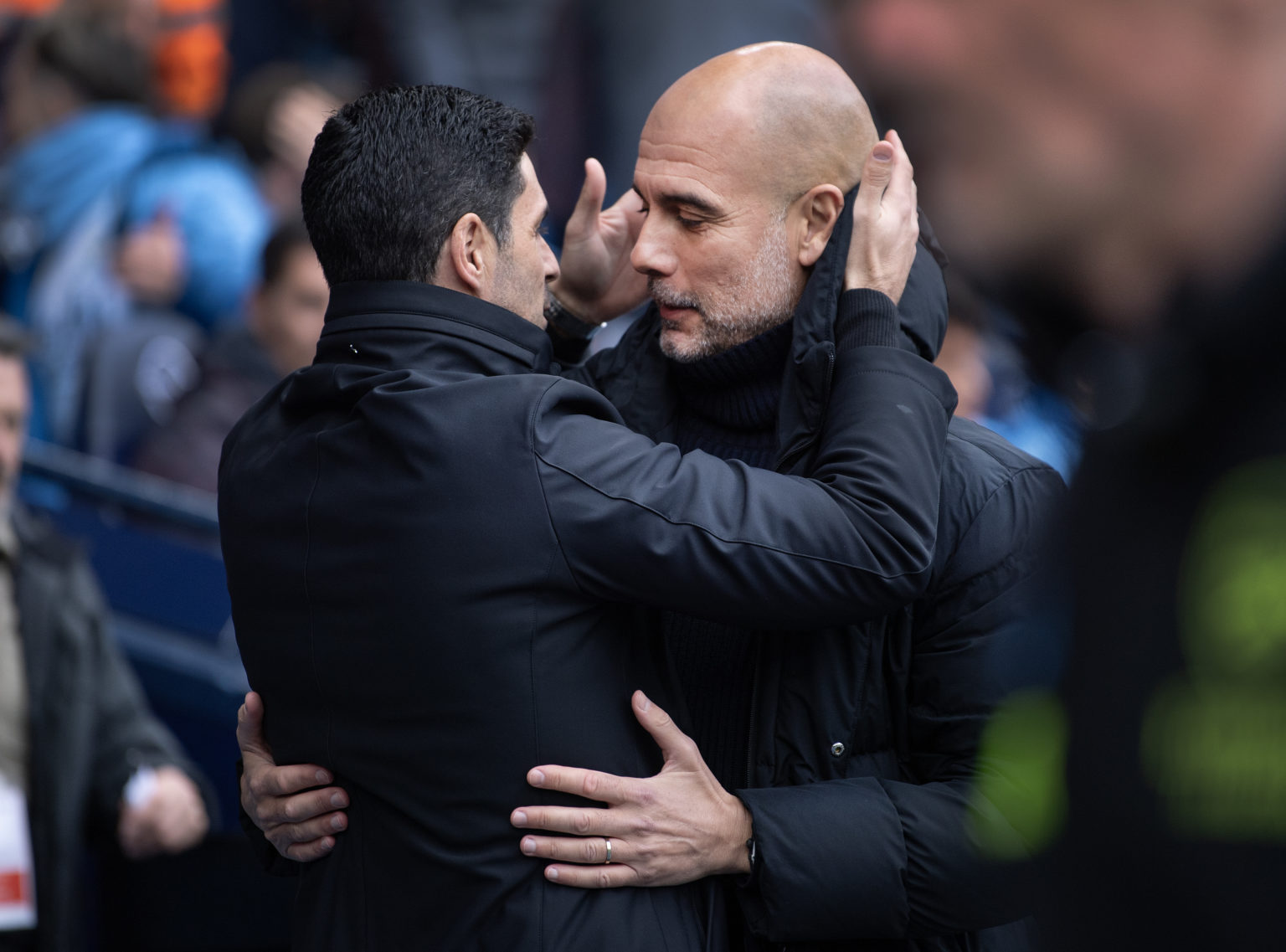 Manchester City manager Pep Guardiola and Arsenal manager Mikel Arteta greet each other before the Premier League match between Manchester City and...