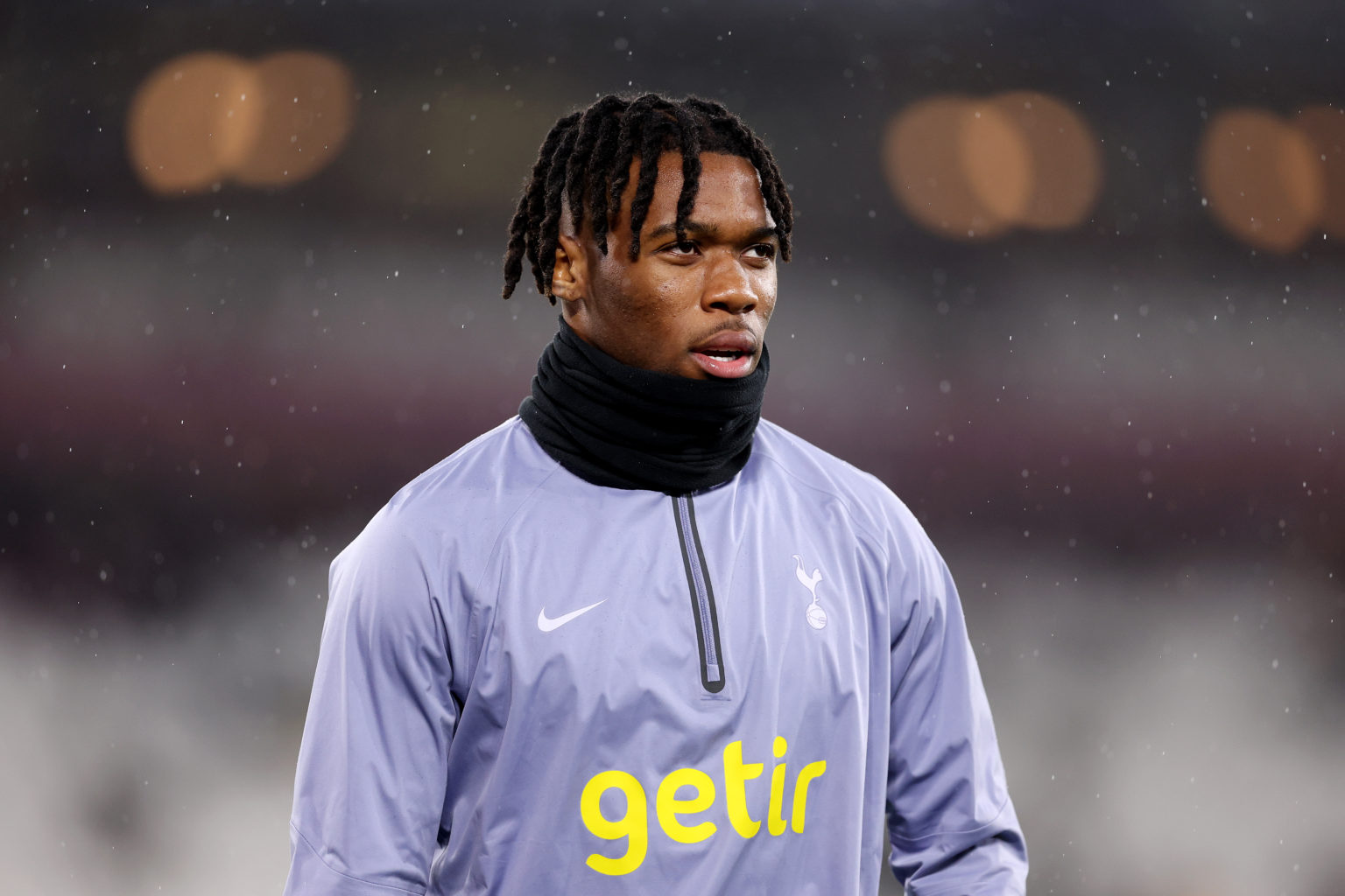 Destiny Udogie of Tottenham Hotspur warms up prior to the Premier League match between West Ham United and Tottenham Hotspur at the London Stadium ...